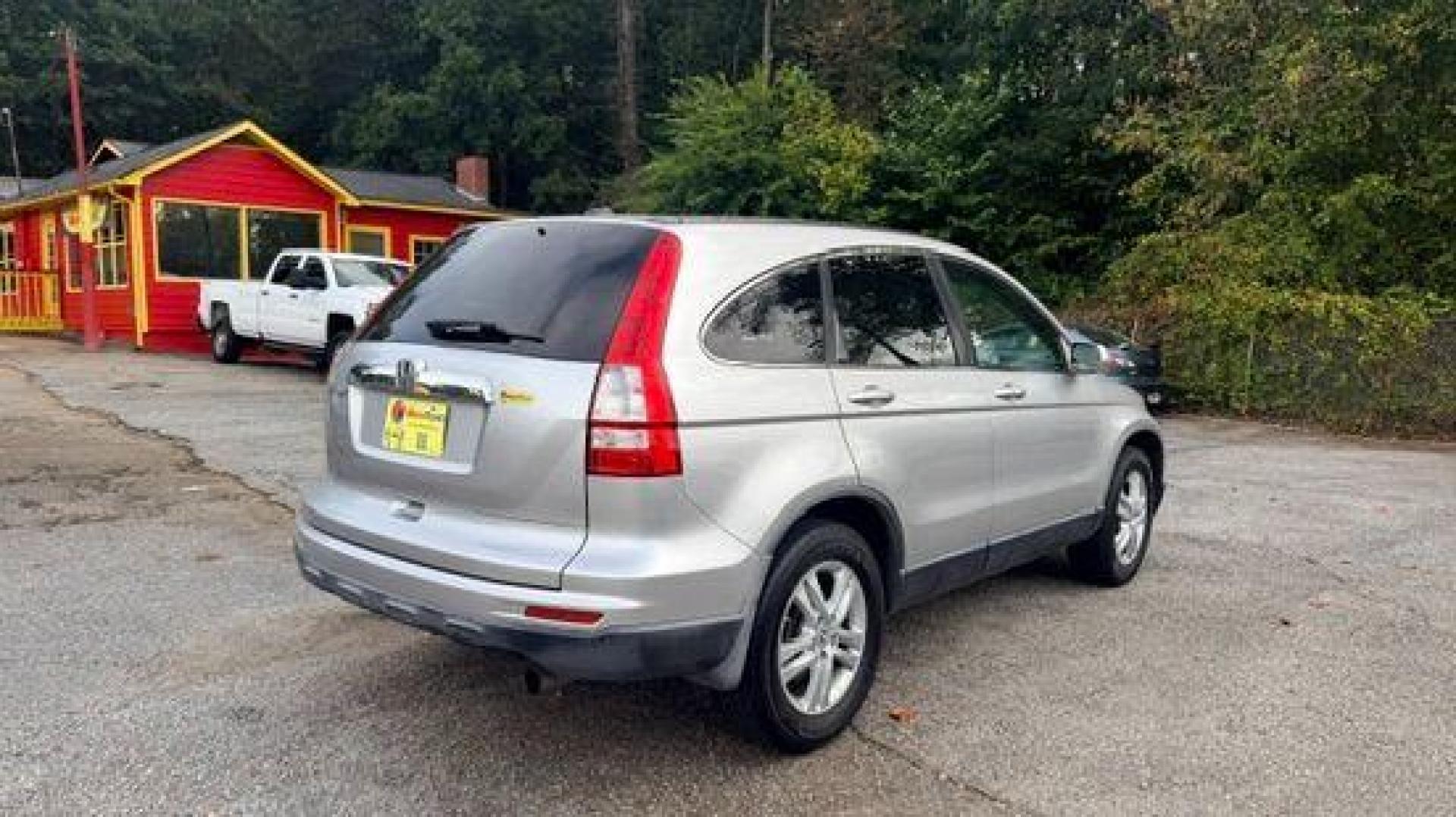 2011 Silver Honda CR-V EX-L (JHLRE3H75BC) with an 2.4L I-4 DOHC engine, located at 1806 Veterans Memorial Hwy SW, Austell, GA, 30168, (770) 944-9558, 33.817959, -84.606987 - Photo#3