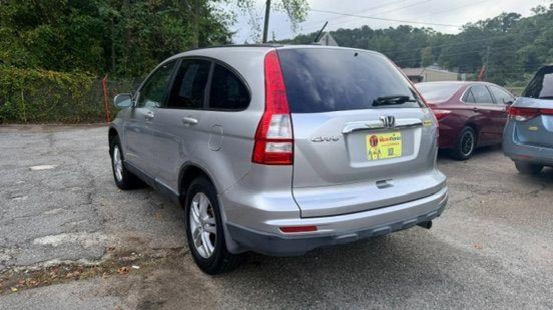 2011 Silver Honda CR-V EX-L (JHLRE3H75BC) with an 2.4L I-4 DOHC engine, located at 1806 Veterans Memorial Hwy SW, Austell, GA, 30168, (770) 944-9558, 33.817959, -84.606987 - Photo#5