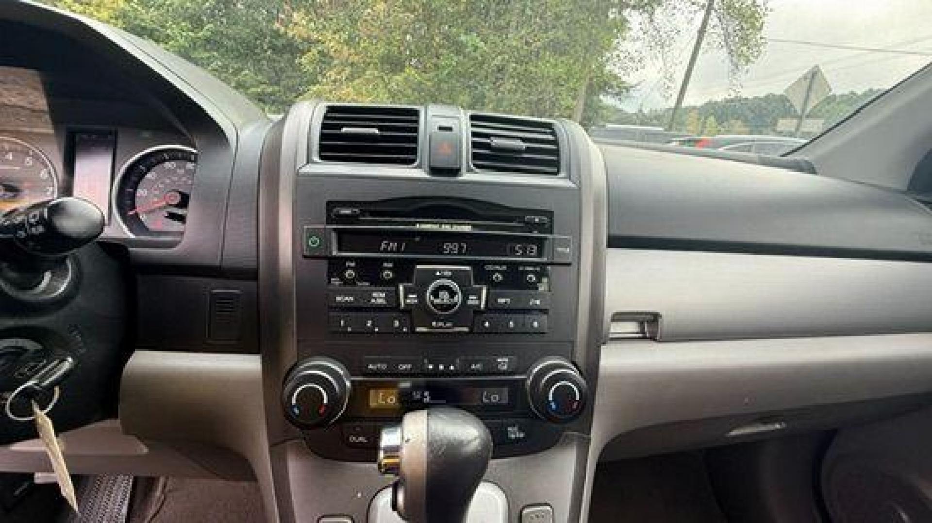 2011 Silver Honda CR-V EX-L (JHLRE3H75BC) with an 2.4L I-4 DOHC engine, located at 1806 Veterans Memorial Hwy SW, Austell, GA, 30168, (770) 944-9558, 33.817959, -84.606987 - Photo#11