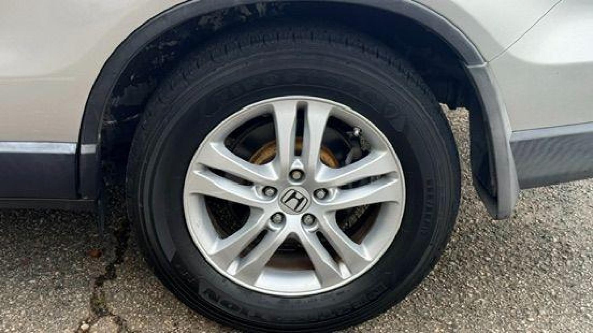 2011 Silver Honda CR-V EX-L (JHLRE3H75BC) with an 2.4L I-4 DOHC engine, located at 1806 Veterans Memorial Hwy SW, Austell, GA, 30168, (770) 944-9558, 33.817959, -84.606987 - Photo#16