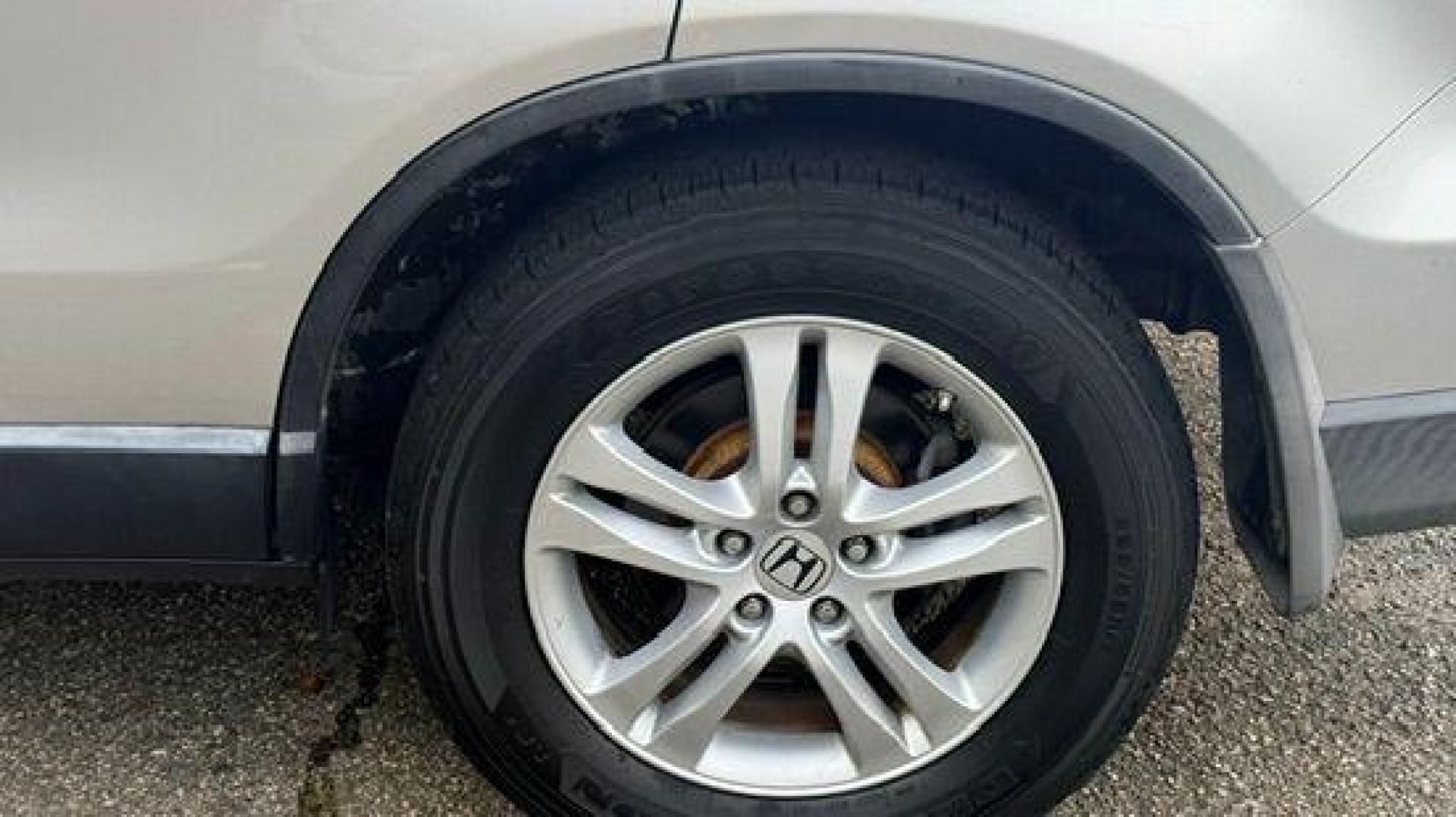 2011 Silver Honda CR-V EX-L (JHLRE3H75BC) with an 2.4L I-4 DOHC engine, located at 1806 Veterans Memorial Hwy SW, Austell, GA, 30168, (770) 944-9558, 33.817959, -84.606987 - Photo#17