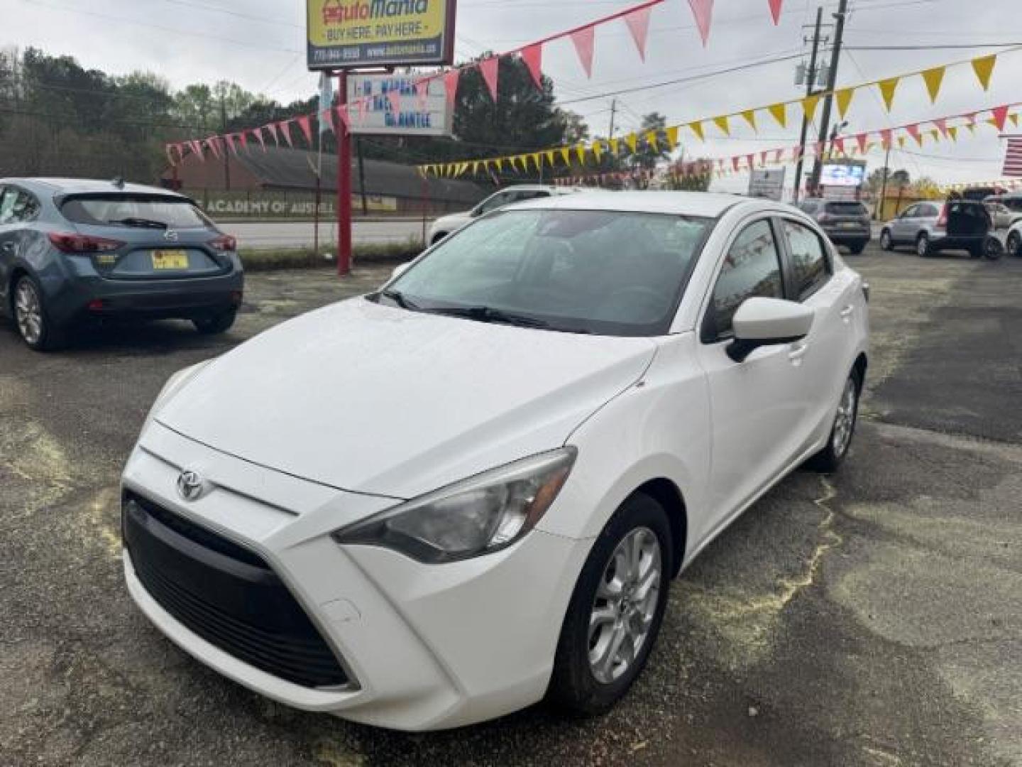 2018 White Toyota Yaris iA IA (3MYDLBYV3JY) , located at 1806 Veterans Memorial Hwy SW, Austell, GA, 30168, (770) 944-9558, 33.817959, -84.606987 - Photo#0