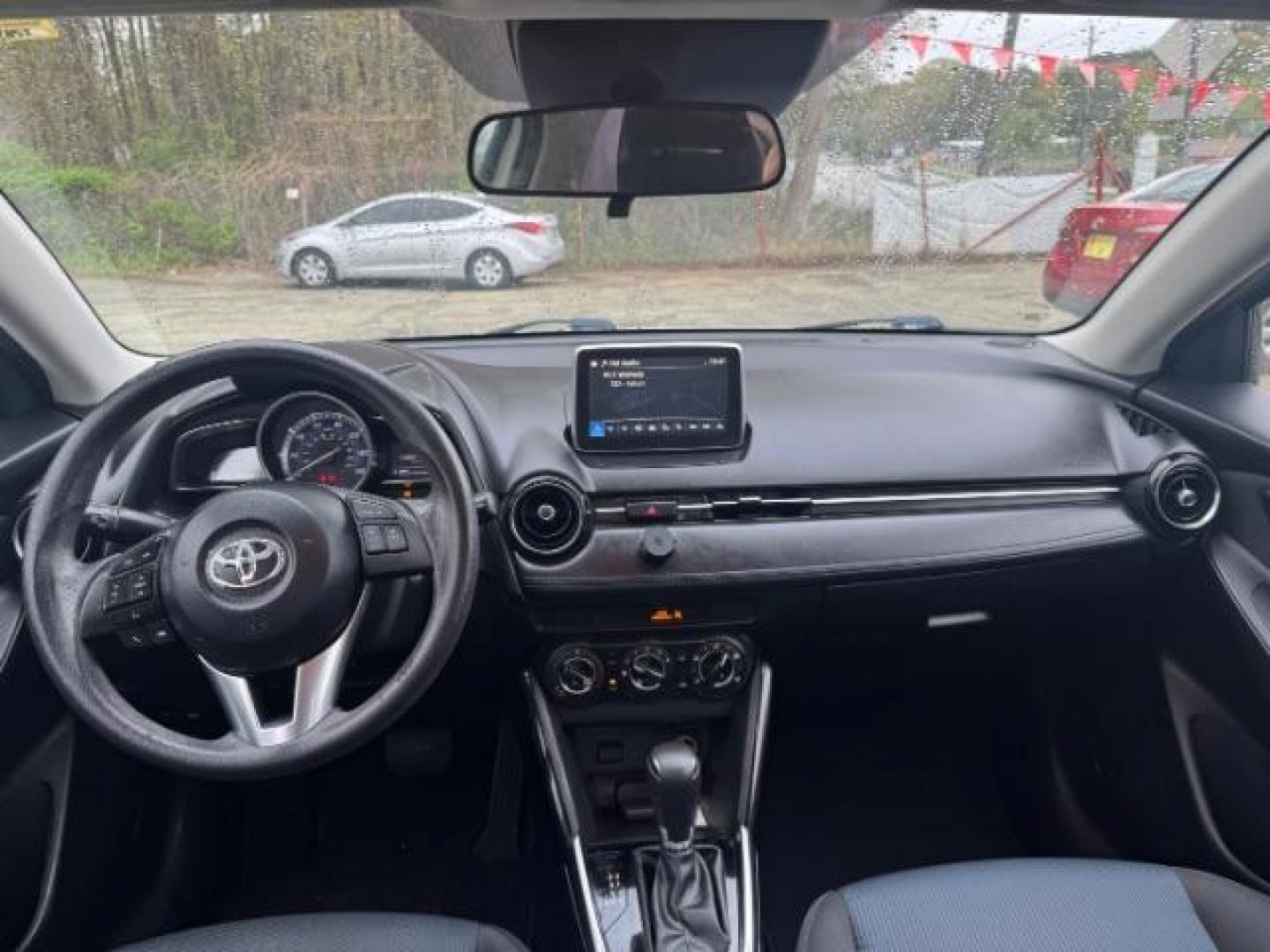 2018 White Toyota Yaris iA IA (3MYDLBYV3JY) , located at 1806 Veterans Memorial Hwy SW, Austell, GA, 30168, (770) 944-9558, 33.817959, -84.606987 - Photo#12