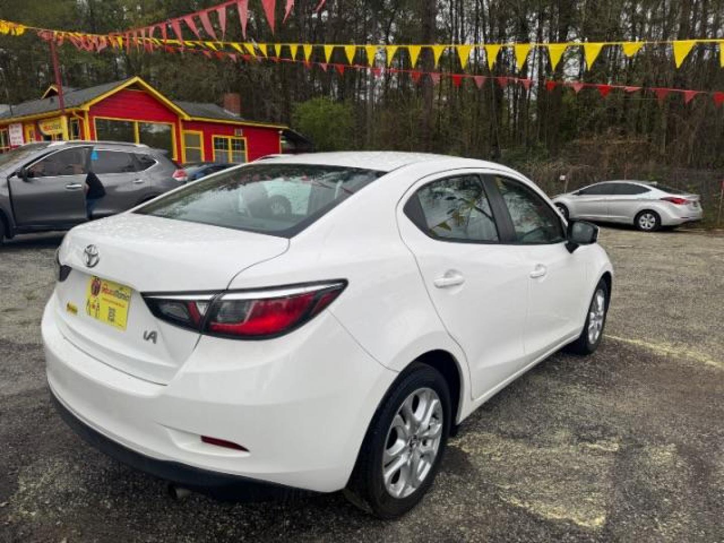 2018 White Toyota Yaris iA IA (3MYDLBYV3JY) , located at 1806 Veterans Memorial Hwy SW, Austell, GA, 30168, (770) 944-9558, 33.817959, -84.606987 - Photo#3