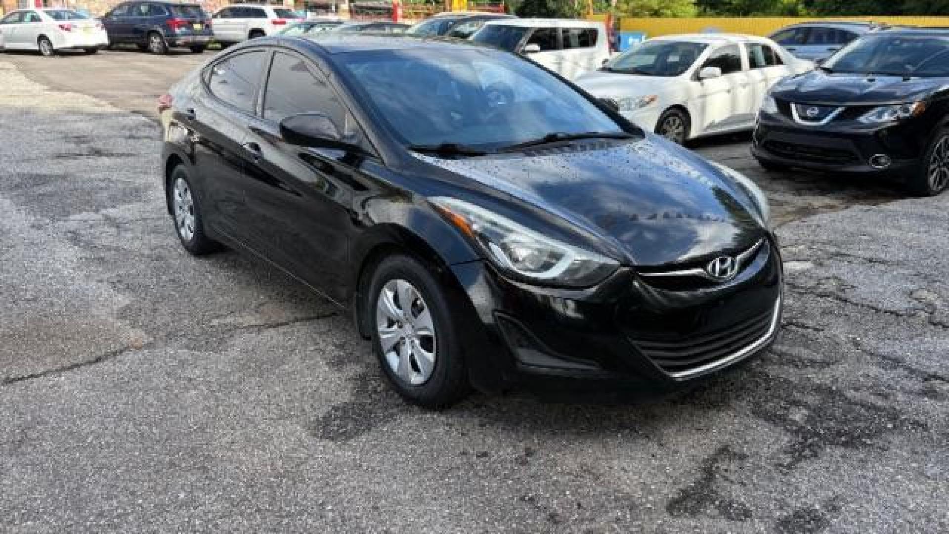 2016 Black Hyundai Elantra SE (5NPDH4AE5GH) with an Nu 1.8L I-4 DOHC engine, located at 1806 Veterans Memorial Hwy SW, Austell, GA, 30168, (770) 944-9558, 33.817959, -84.606987 - Photo#2