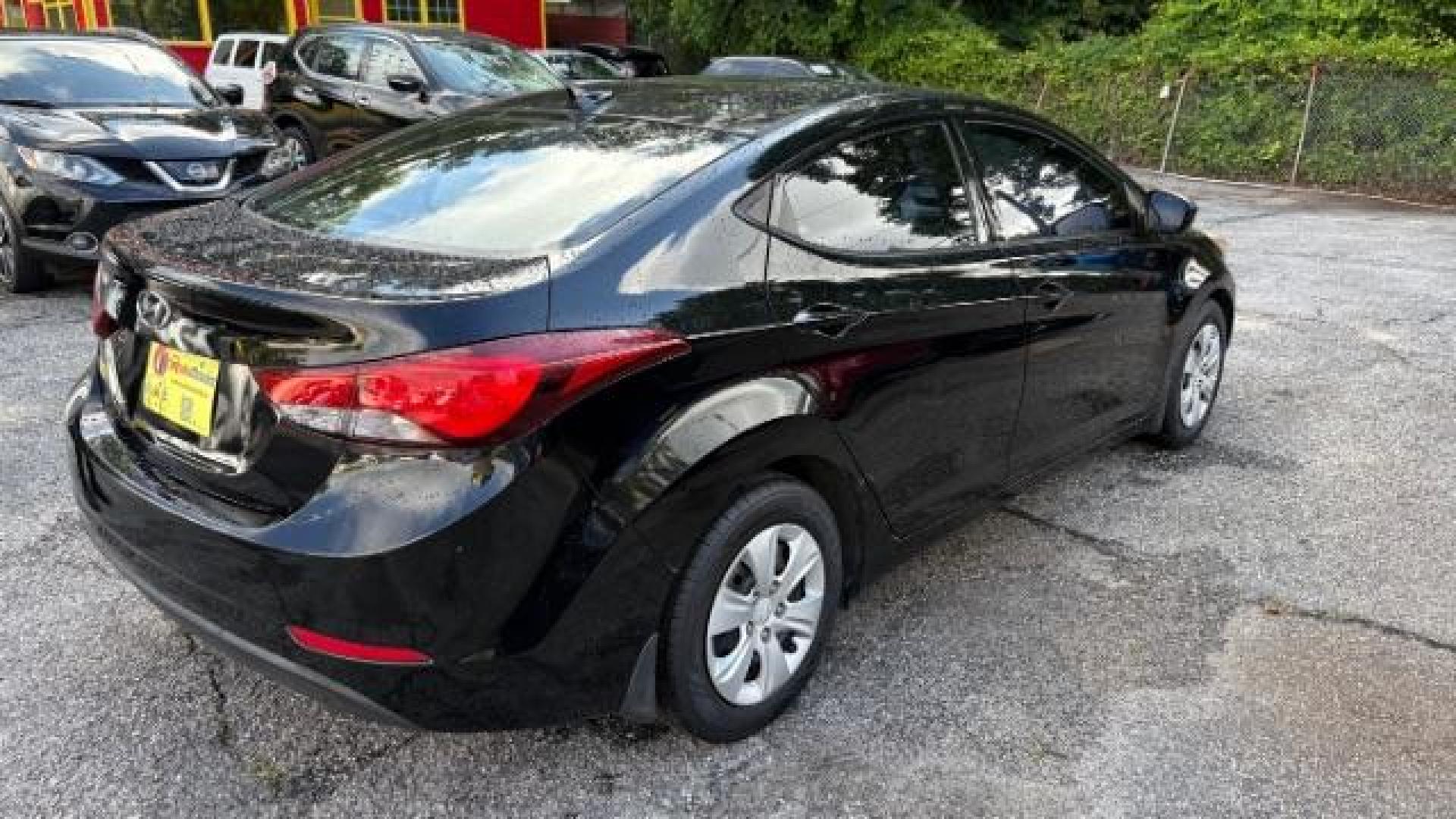 2016 Black Hyundai Elantra SE (5NPDH4AE5GH) with an Nu 1.8L I-4 DOHC engine, located at 1806 Veterans Memorial Hwy SW, Austell, GA, 30168, (770) 944-9558, 33.817959, -84.606987 - Photo#3