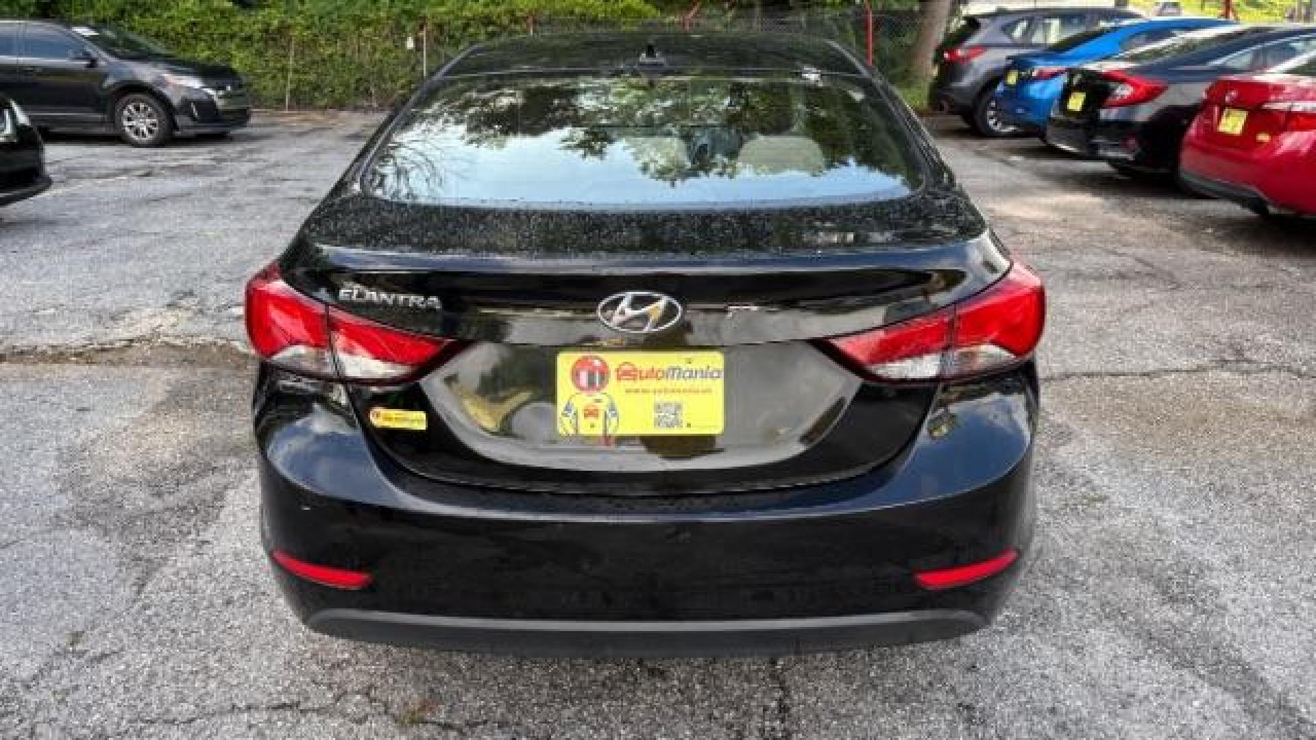 2016 Black Hyundai Elantra SE (5NPDH4AE5GH) with an Nu 1.8L I-4 DOHC engine, located at 1806 Veterans Memorial Hwy SW, Austell, GA, 30168, (770) 944-9558, 33.817959, -84.606987 - Photo#4