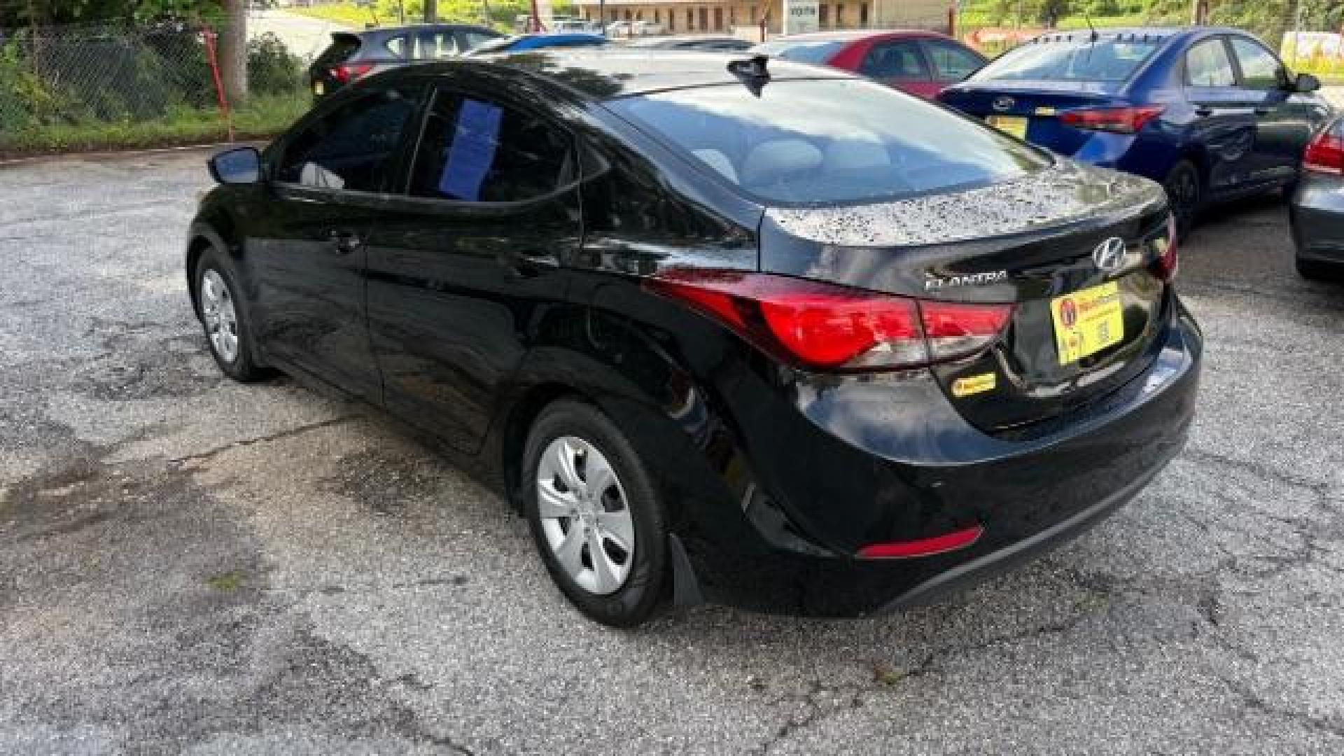2016 Black Hyundai Elantra SE (5NPDH4AE5GH) with an Nu 1.8L I-4 DOHC engine, located at 1806 Veterans Memorial Hwy SW, Austell, GA, 30168, (770) 944-9558, 33.817959, -84.606987 - Photo#5