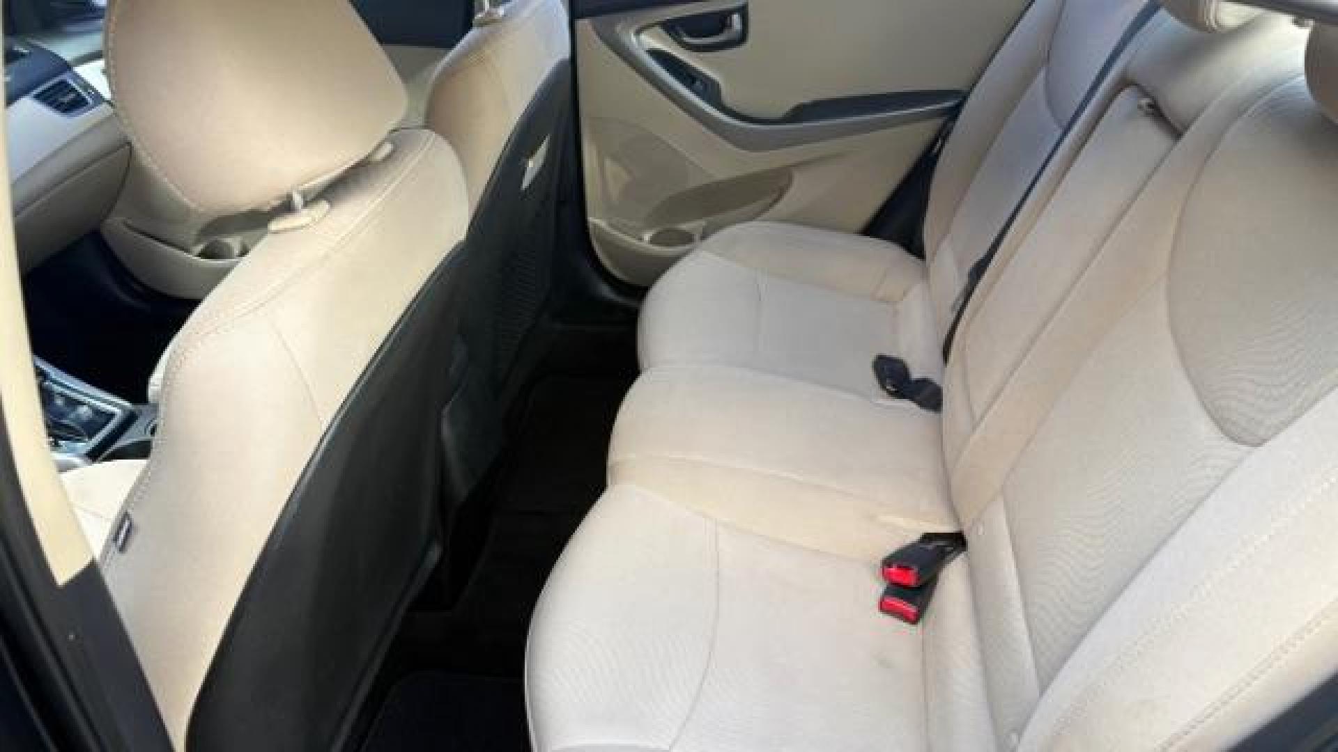 2016 Black Hyundai Elantra SE (5NPDH4AE5GH) with an Nu 1.8L I-4 DOHC engine, located at 1806 Veterans Memorial Hwy SW, Austell, GA, 30168, (770) 944-9558, 33.817959, -84.606987 - Photo#6