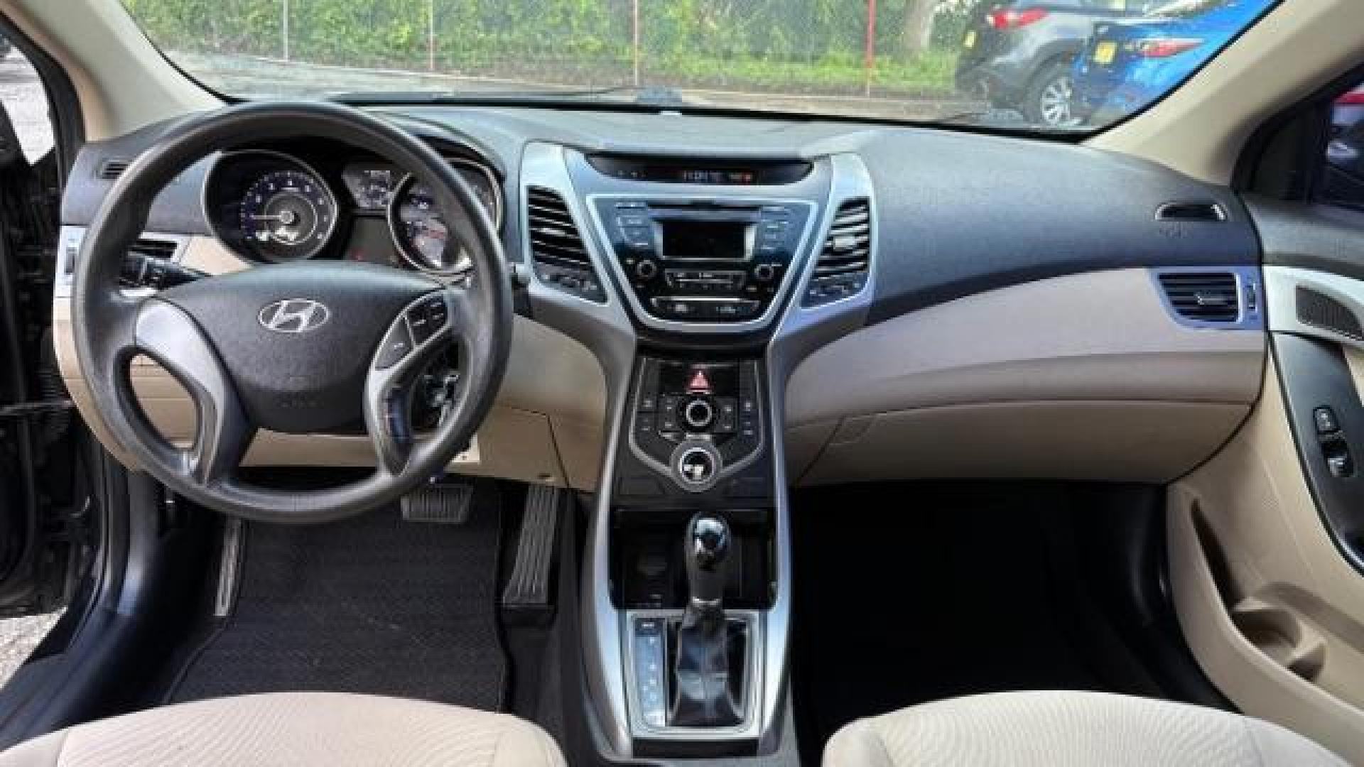 2016 Black Hyundai Elantra SE (5NPDH4AE5GH) with an Nu 1.8L I-4 DOHC engine, located at 1806 Veterans Memorial Hwy SW, Austell, GA, 30168, (770) 944-9558, 33.817959, -84.606987 - Photo#8