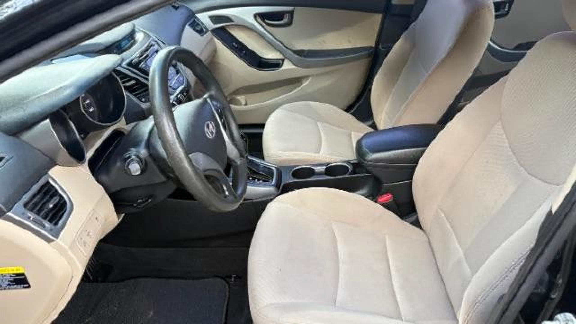 2016 Black Hyundai Elantra SE (5NPDH4AE5GH) with an Nu 1.8L I-4 DOHC engine, located at 1806 Veterans Memorial Hwy SW, Austell, GA, 30168, (770) 944-9558, 33.817959, -84.606987 - Photo#10