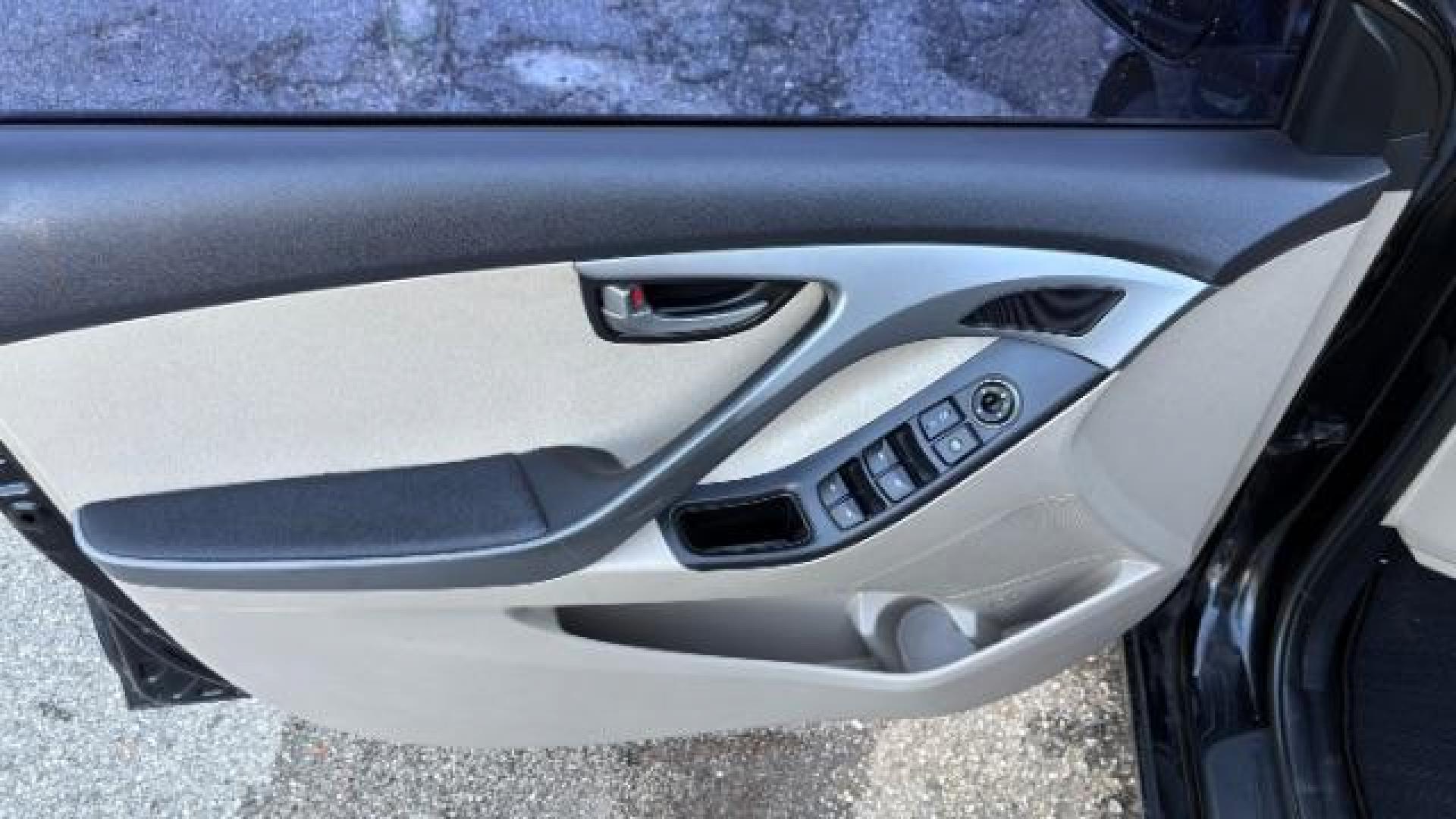 2016 Black Hyundai Elantra SE (5NPDH4AE5GH) with an Nu 1.8L I-4 DOHC engine, located at 1806 Veterans Memorial Hwy SW, Austell, GA, 30168, (770) 944-9558, 33.817959, -84.606987 - Photo#10