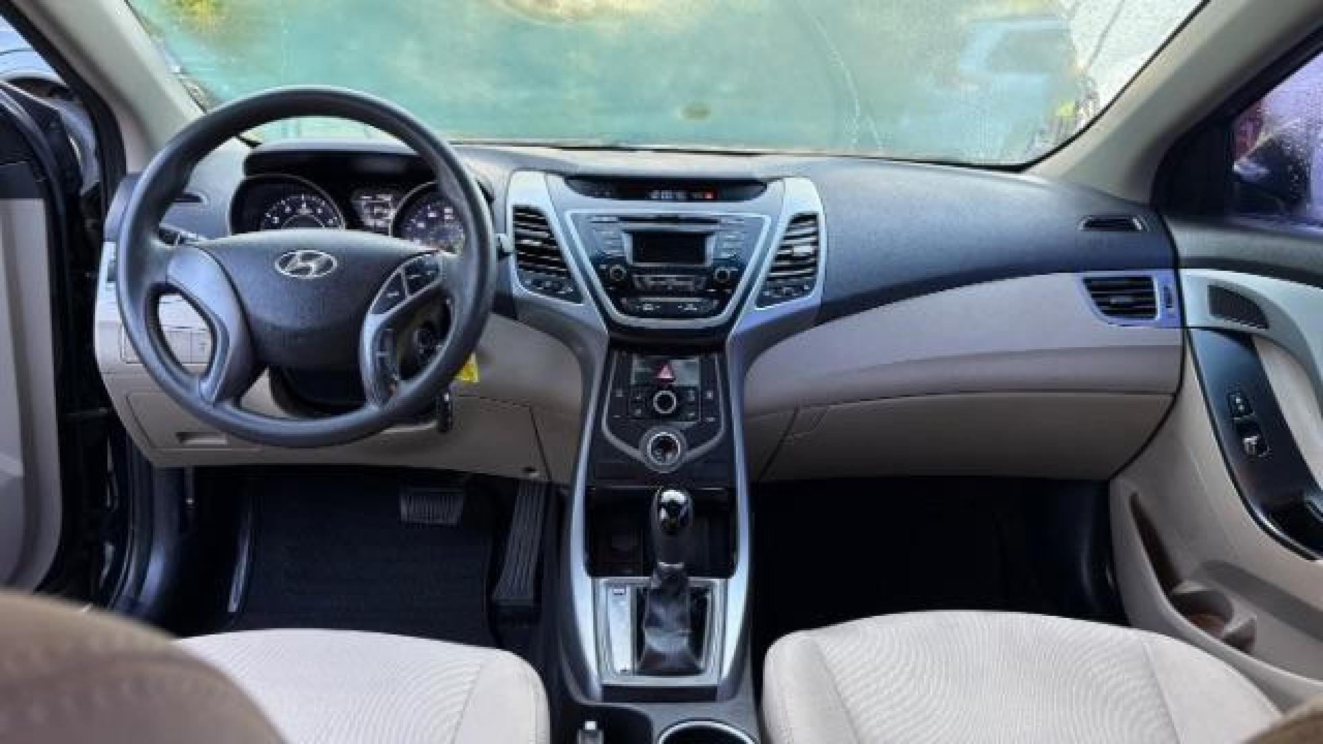 2016 Black Hyundai Elantra SE (5NPDH4AE5GH) with an Nu 1.8L I-4 DOHC engine, located at 1806 Veterans Memorial Hwy SW, Austell, GA, 30168, (770) 944-9558, 33.817959, -84.606987 - Photo#13