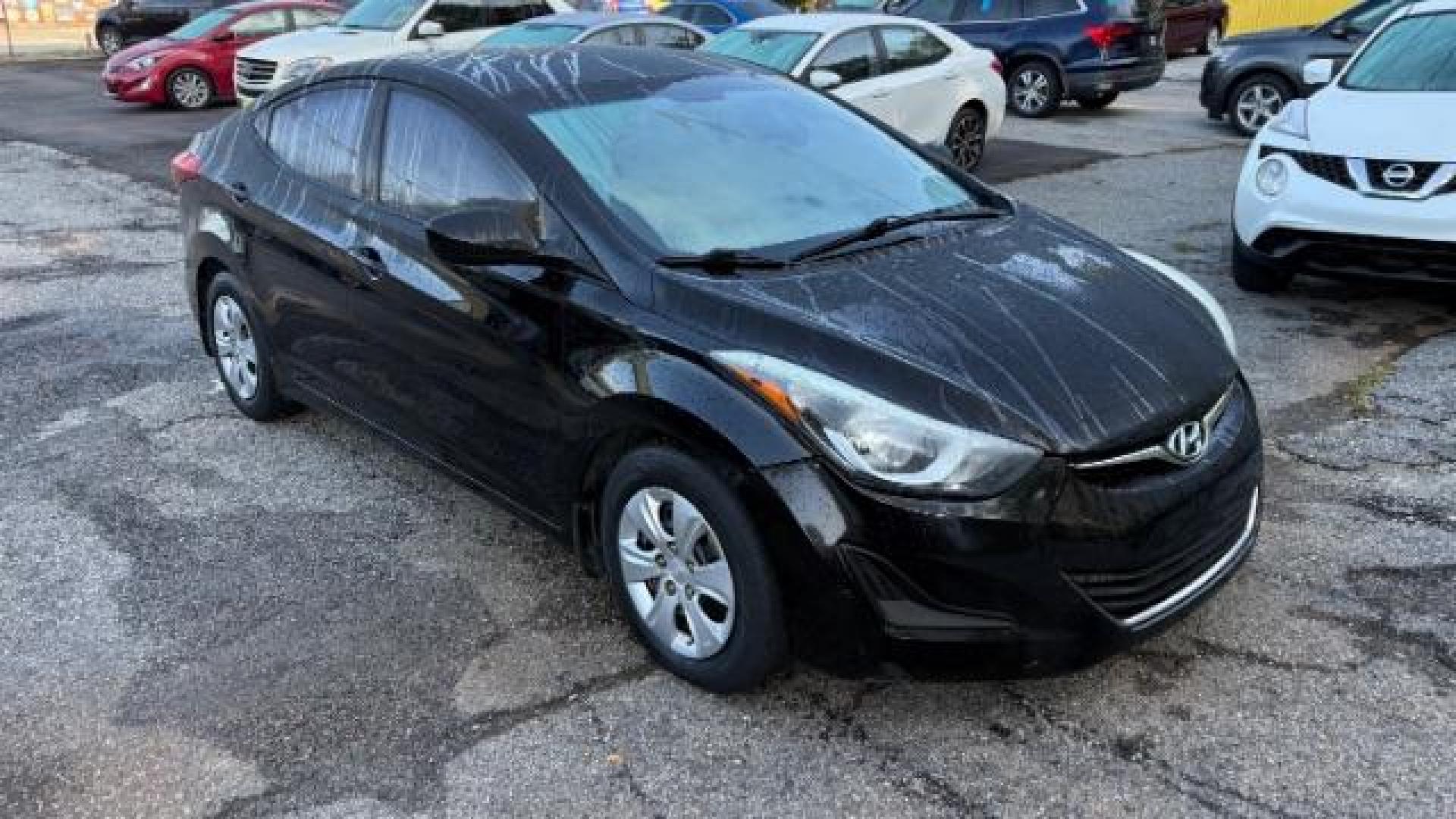 2016 Black Hyundai Elantra SE (5NPDH4AE5GH) with an Nu 1.8L I-4 DOHC engine, located at 1806 Veterans Memorial Hwy SW, Austell, GA, 30168, (770) 944-9558, 33.817959, -84.606987 - Photo#2