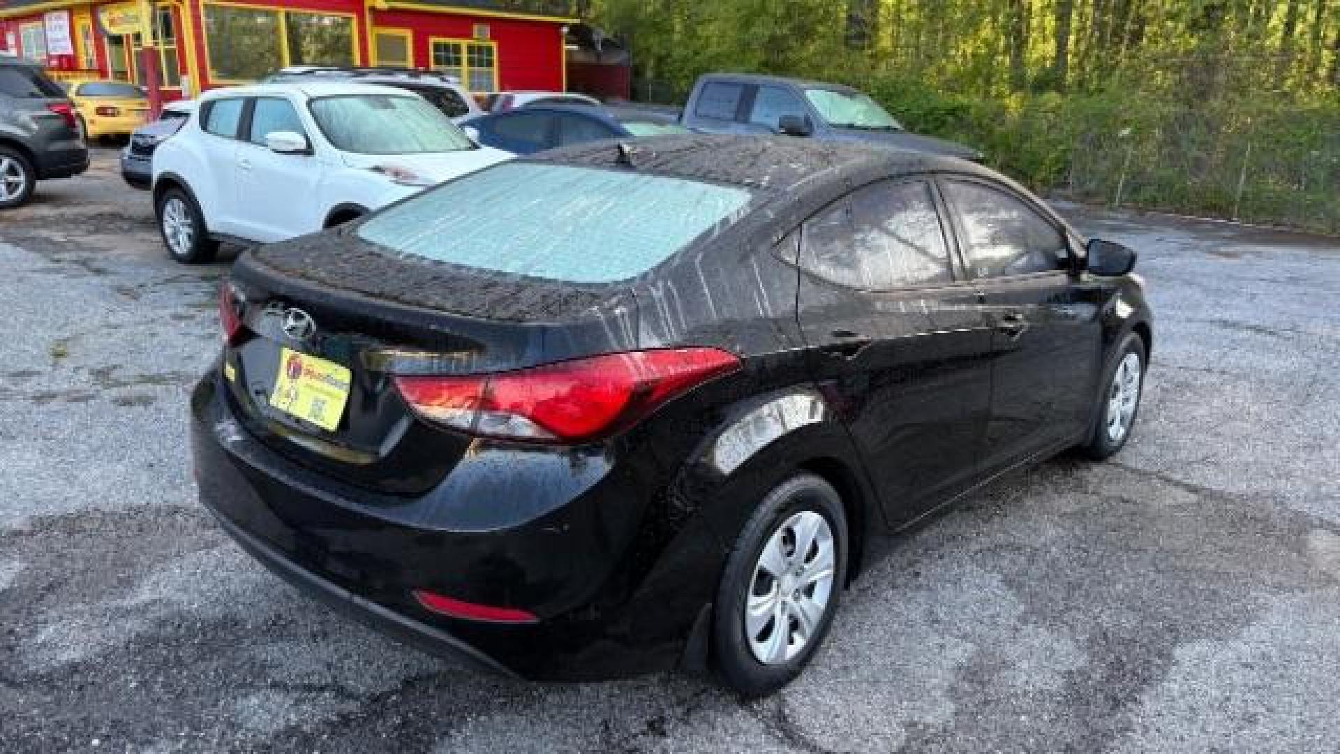 2016 Black Hyundai Elantra SE (5NPDH4AE5GH) with an Nu 1.8L I-4 DOHC engine, located at 1806 Veterans Memorial Hwy SW, Austell, GA, 30168, (770) 944-9558, 33.817959, -84.606987 - Photo#3