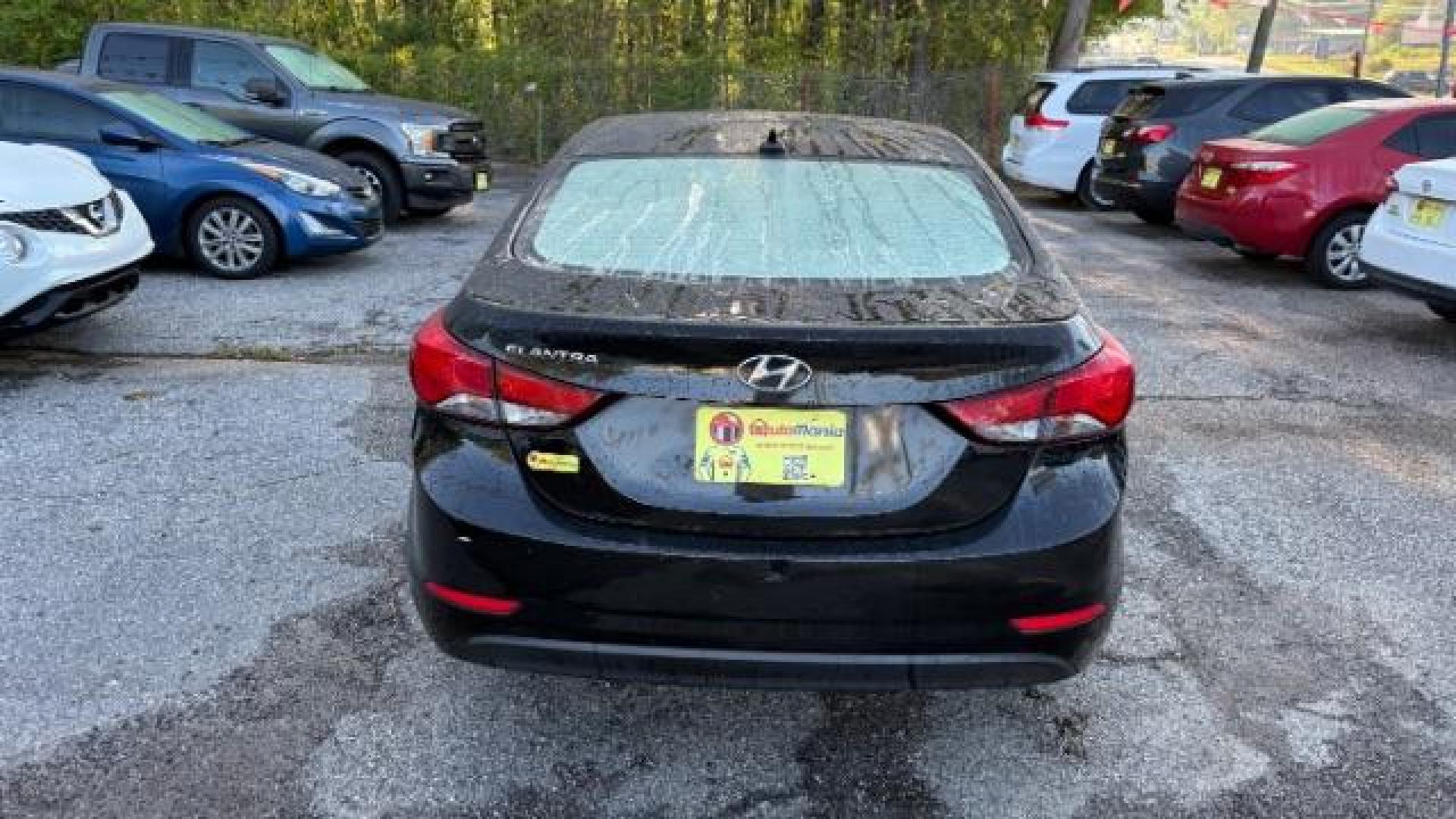 2016 Black Hyundai Elantra SE (5NPDH4AE5GH) with an Nu 1.8L I-4 DOHC engine, located at 1806 Veterans Memorial Hwy SW, Austell, GA, 30168, (770) 944-9558, 33.817959, -84.606987 - Photo#4