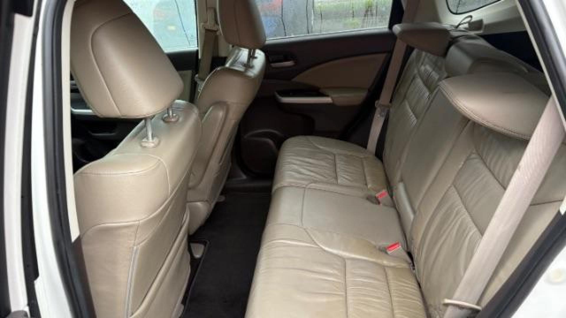 2014 White Honda CR-V EX-L (5J6RM3H78EL) with an 2.4L I-4 DOHC engine, located at 1806 Veterans Memorial Hwy SW, Austell, GA, 30168, (770) 944-9558, 33.817959, -84.606987 - Photo#10