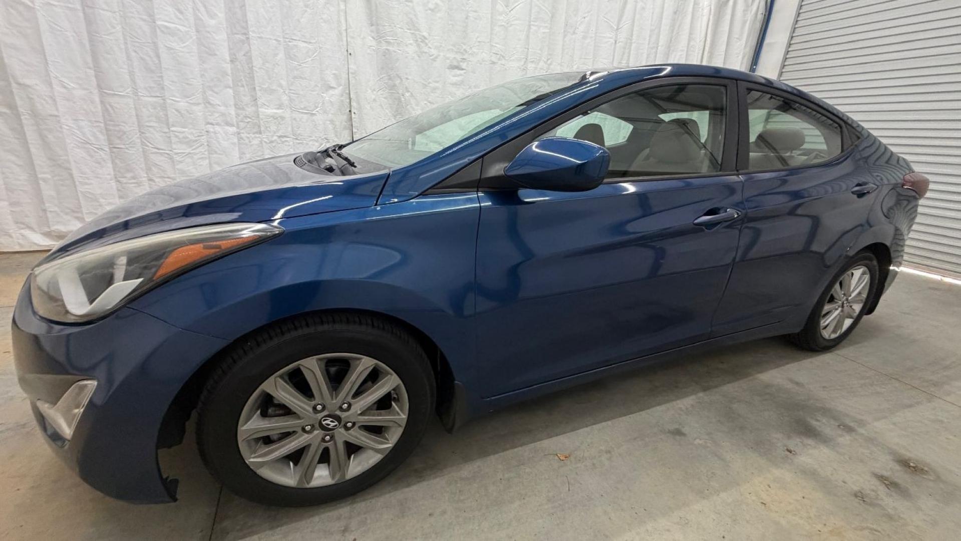 2015 Blue Hyundai Elantra SE (KMHDH4AE3FU) with an Nu 1.8L I-4 DOHC engine, located at 1806 Veterans Memorial Hwy SW, Austell, GA, 30168, (770) 944-9558, 33.817959, -84.606987- Photo#1
