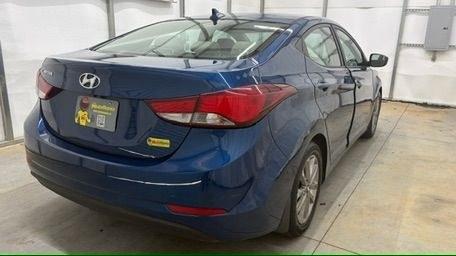 2015 Blue Hyundai Elantra SE (KMHDH4AE3FU) with an Nu 1.8L I-4 DOHC engine, located at 1806 Veterans Memorial Hwy SW, Austell, GA, 30168, (770) 944-9558, 33.817959, -84.606987- Photo#5
