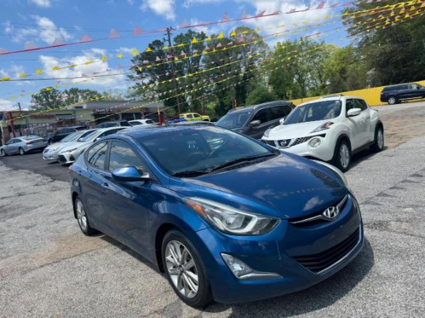 2015 Blue Hyundai Elantra SE (KMHDH4AE3FU) with an Nu 1.8L I-4 DOHC engine, located at 1806 Veterans Memorial Hwy SW, Austell, GA, 30168, (770) 944-9558, 33.817959, -84.606987 - Photo#2
