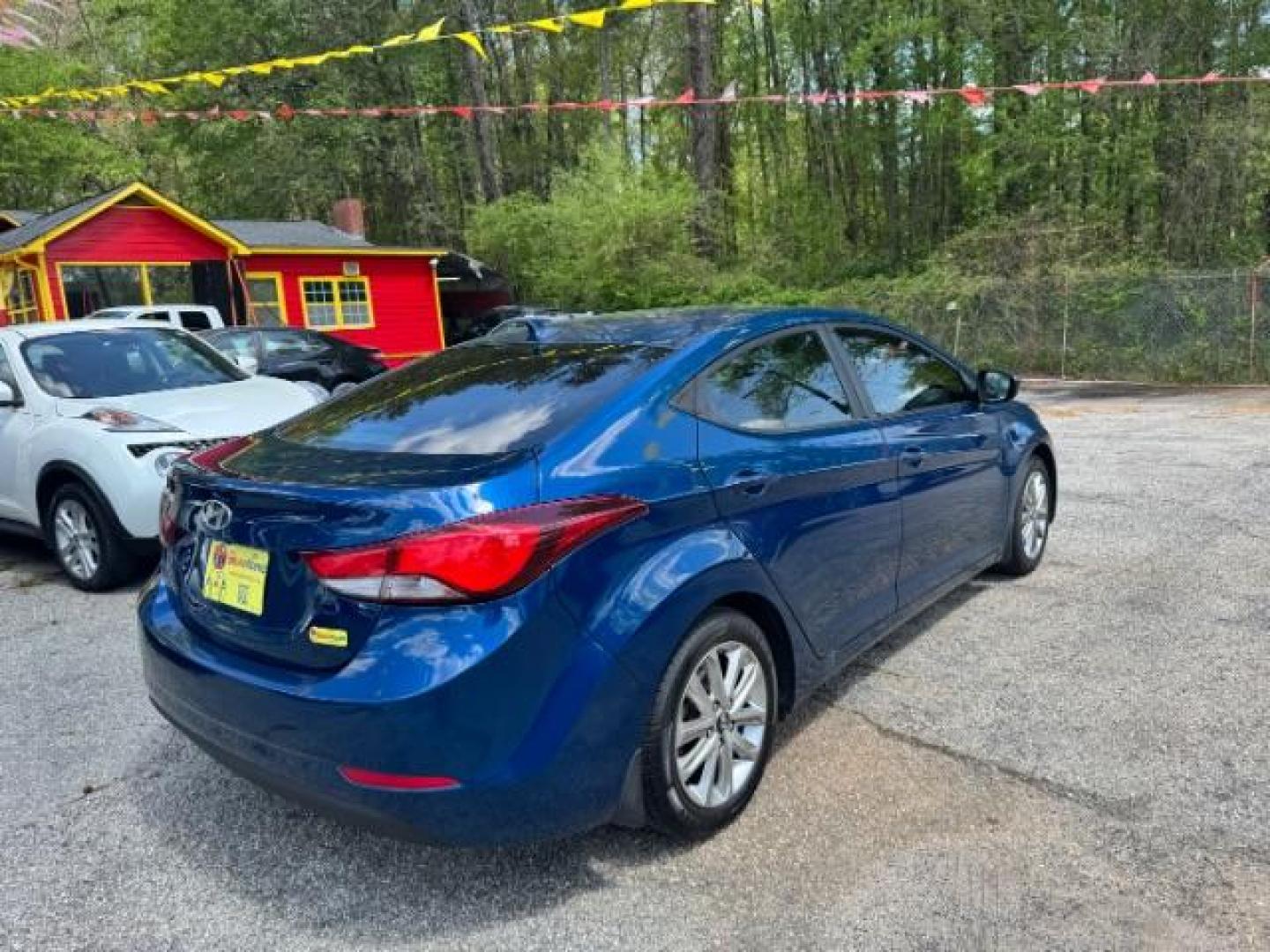 2015 Blue Hyundai Elantra SE (KMHDH4AE3FU) with an Nu 1.8L I-4 DOHC engine, located at 1806 Veterans Memorial Hwy SW, Austell, GA, 30168, (770) 944-9558, 33.817959, -84.606987 - Photo#3