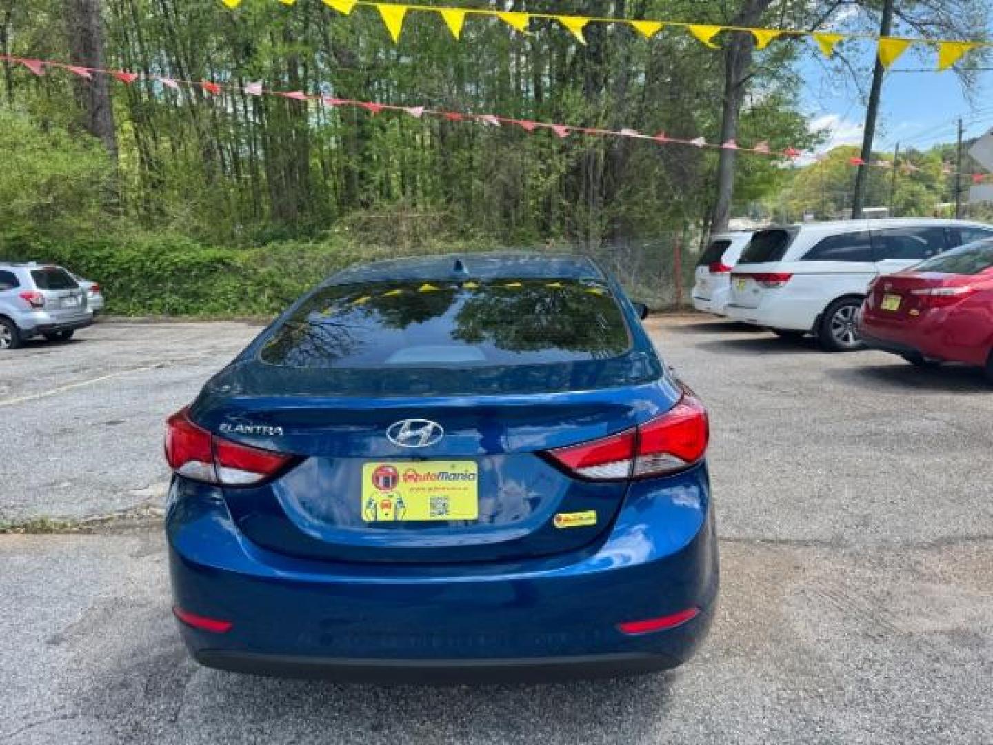 2015 Blue Hyundai Elantra SE (KMHDH4AE3FU) with an Nu 1.8L I-4 DOHC engine, located at 1806 Veterans Memorial Hwy SW, Austell, GA, 30168, (770) 944-9558, 33.817959, -84.606987 - Photo#4