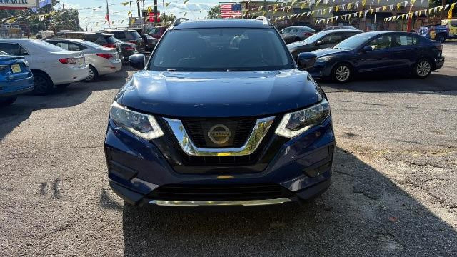 2017 Blue Nissan Rogue SV (JN8AT2MT5HW) with an 2.5L I-4 DOHC engine, located at 1806 Veterans Memorial Hwy SW, Austell, GA, 30168, (770) 944-9558, 33.817959, -84.606987 - Photo#1