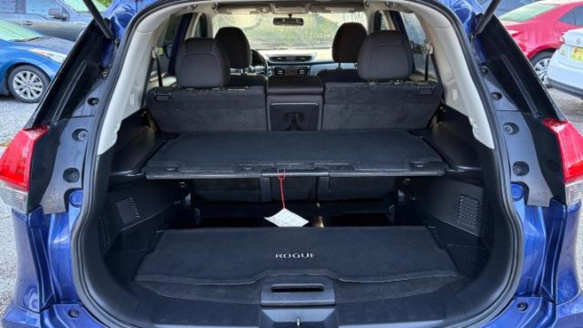 2017 Blue Nissan Rogue SV (JN8AT2MT5HW) with an 2.5L I-4 DOHC engine, located at 1806 Veterans Memorial Hwy SW, Austell, GA, 30168, (770) 944-9558, 33.817959, -84.606987 - Photo#16