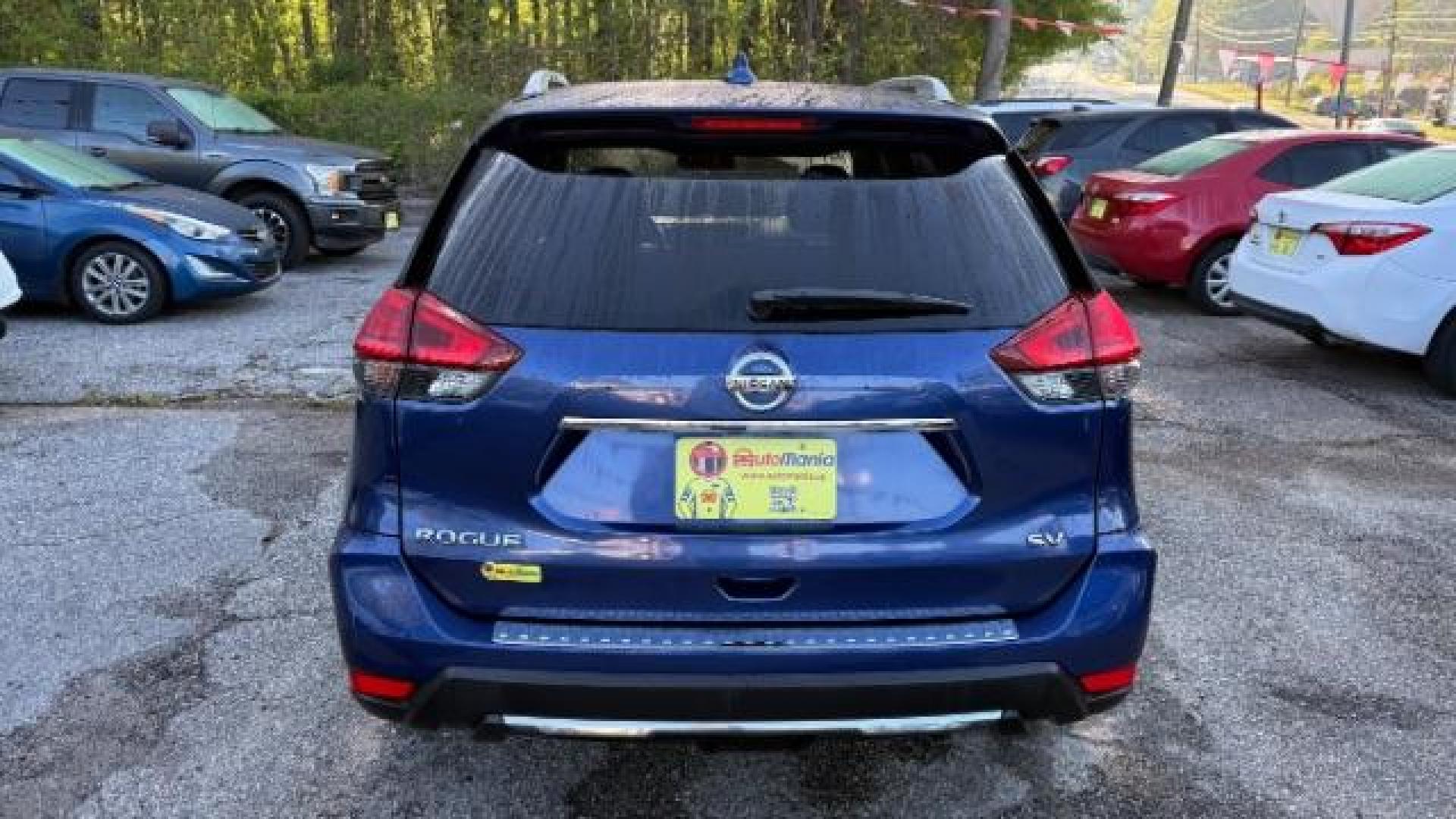2017 Blue Nissan Rogue SV (JN8AT2MT5HW) with an 2.5L I-4 DOHC engine, located at 1806 Veterans Memorial Hwy SW, Austell, GA, 30168, (770) 944-9558, 33.817959, -84.606987 - Photo#4
