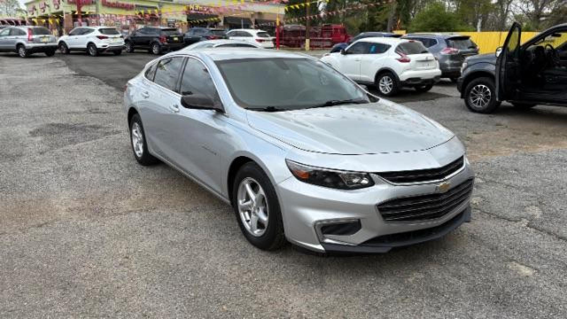 2018 Gray Chevrolet Malibu 1LS (1G1ZB5ST8JF) with an ECOTEC 1.5L I-4 gasoline direct injection engine, located at 1806 Veterans Memorial Hwy SW, Austell, GA, 30168, (770) 944-9558, 33.817959, -84.606987 - Photo#2