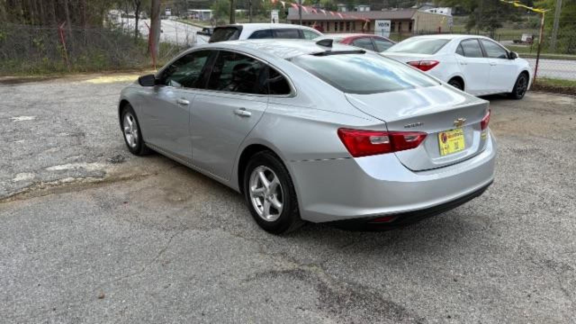 2018 Gray Chevrolet Malibu 1LS (1G1ZB5ST8JF) with an ECOTEC 1.5L I-4 gasoline direct injection engine, located at 1806 Veterans Memorial Hwy SW, Austell, GA, 30168, (770) 944-9558, 33.817959, -84.606987 - Photo#3