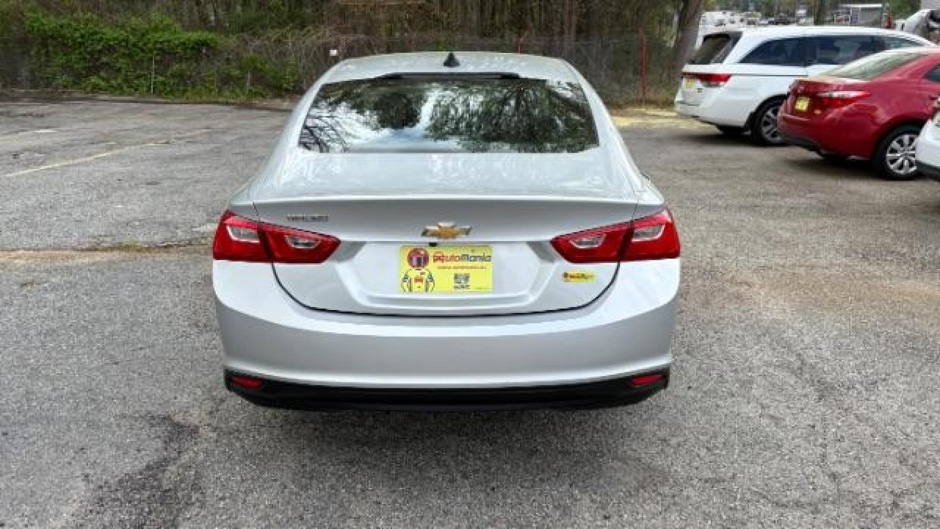 2018 Gray Chevrolet Malibu 1LS (1G1ZB5ST8JF) with an ECOTEC 1.5L I-4 gasoline direct injection engine, located at 1806 Veterans Memorial Hwy SW, Austell, GA, 30168, (770) 944-9558, 33.817959, -84.606987 - Photo#4
