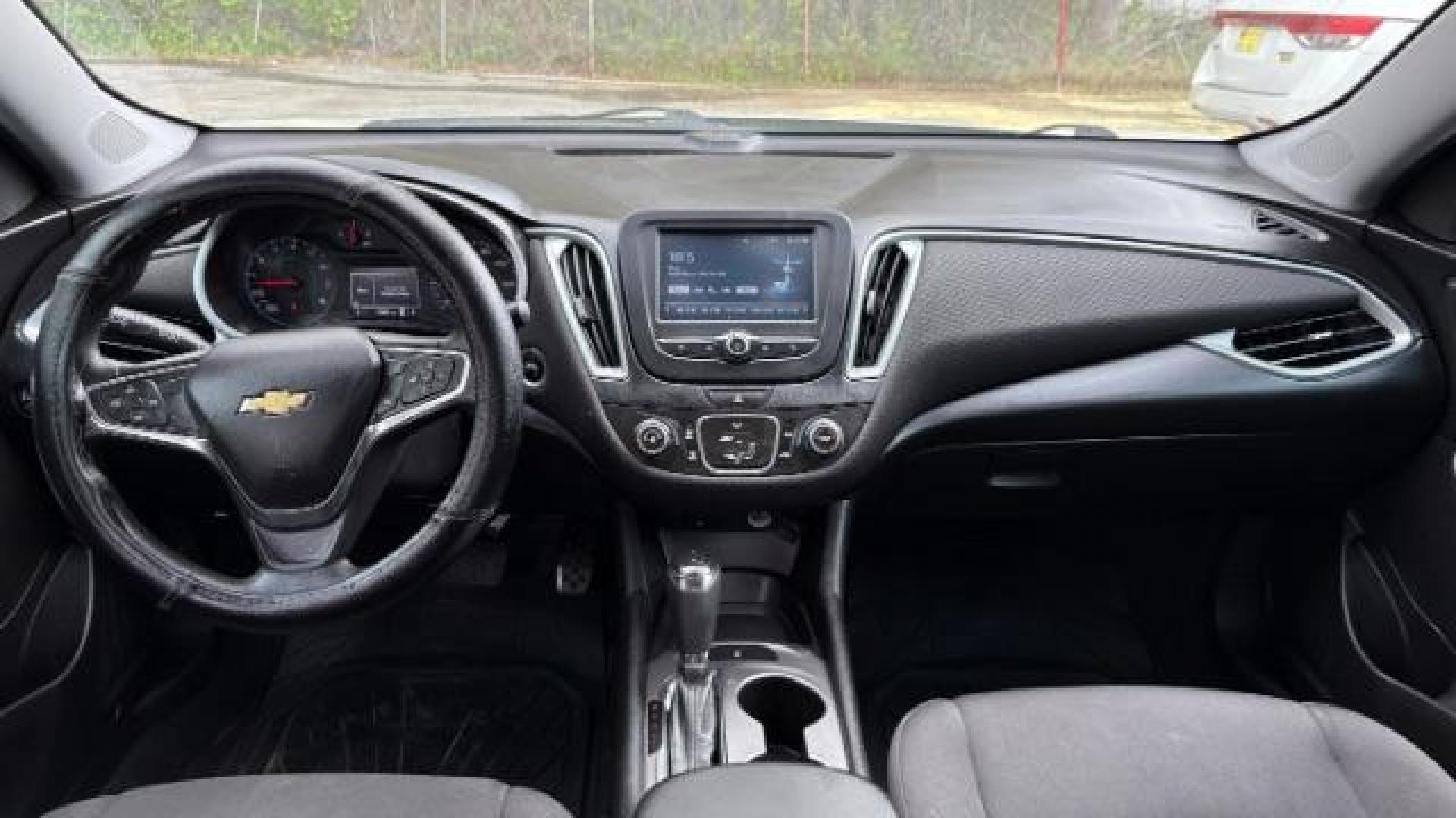 2018 Gray Chevrolet Malibu 1LS (1G1ZB5ST8JF) with an ECOTEC 1.5L I-4 gasoline direct injection engine, located at 1806 Veterans Memorial Hwy SW, Austell, GA, 30168, (770) 944-9558, 33.817959, -84.606987 - Photo#6