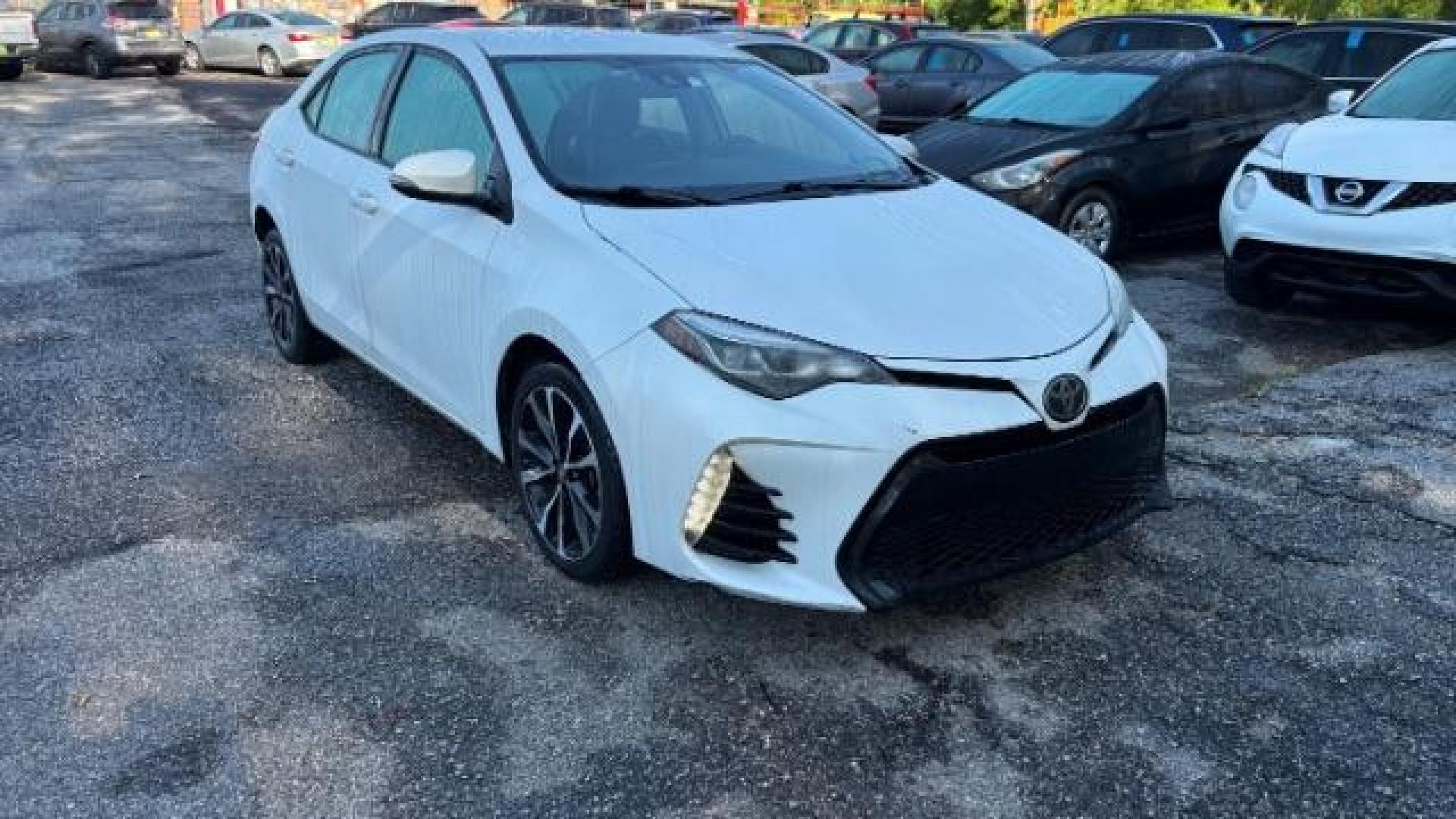 2017 White Toyota Corolla SE (5YFBURHE6HP) with an 1.8L I-4 DOHC engine, located at 1806 Veterans Memorial Hwy SW, Austell, GA, 30168, (770) 944-9558, 33.817959, -84.606987 - Photo#2