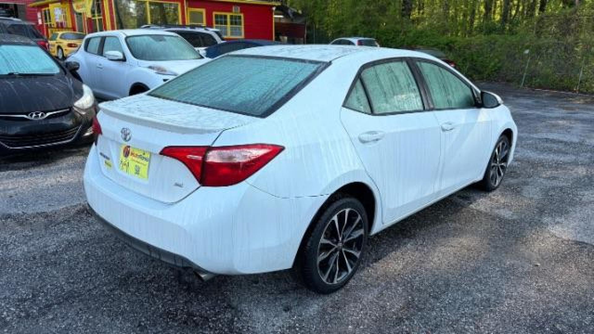 2017 White Toyota Corolla SE (5YFBURHE6HP) with an 1.8L I-4 DOHC engine, located at 1806 Veterans Memorial Hwy SW, Austell, GA, 30168, (770) 944-9558, 33.817959, -84.606987 - Photo#3