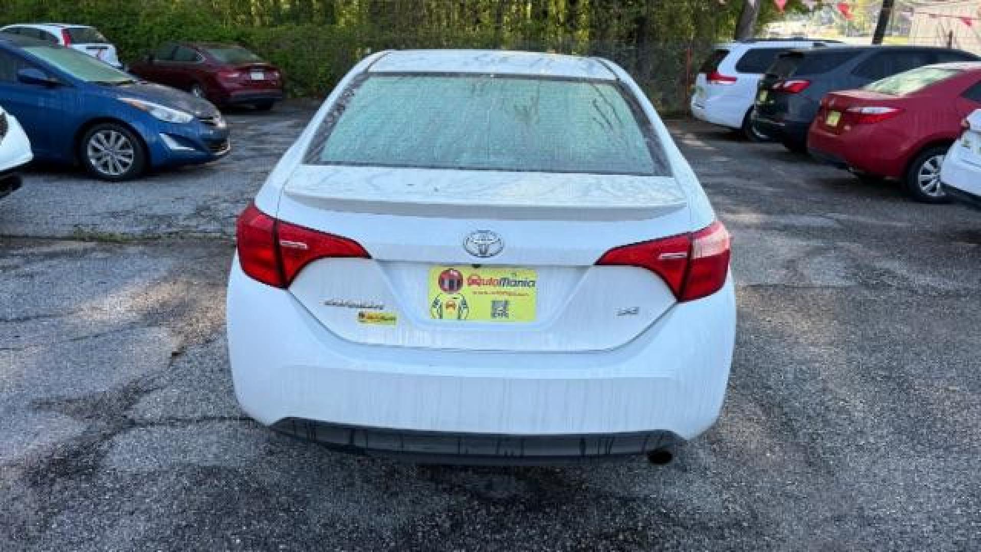 2017 White Toyota Corolla SE (5YFBURHE6HP) with an 1.8L I-4 DOHC engine, located at 1806 Veterans Memorial Hwy SW, Austell, GA, 30168, (770) 944-9558, 33.817959, -84.606987 - Photo#4