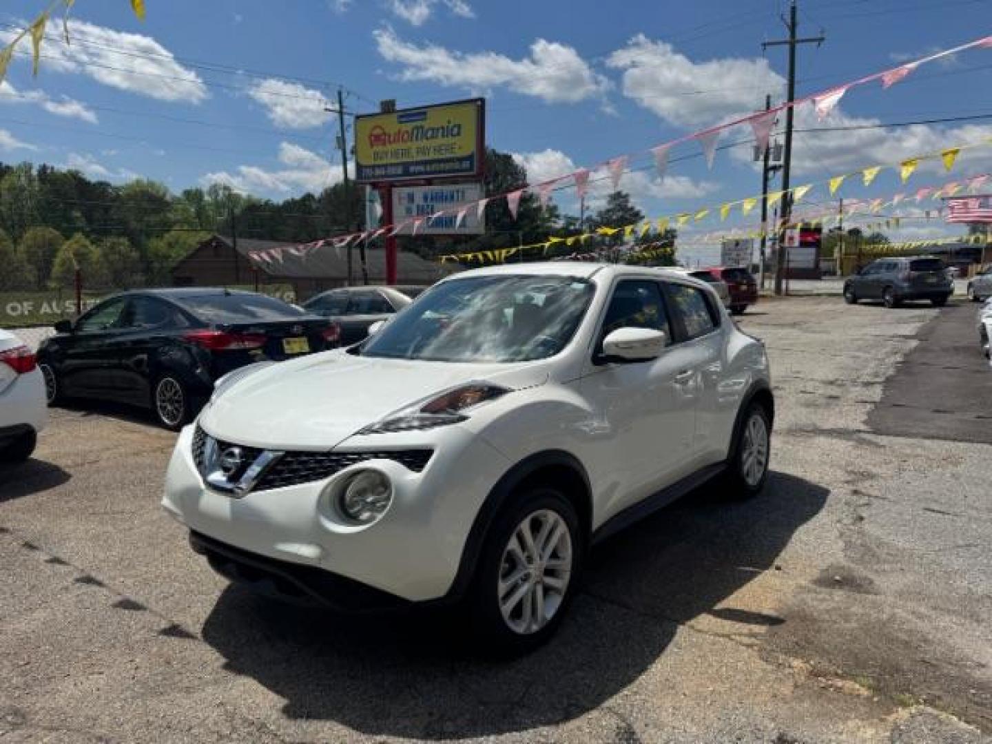 2015 Cream Nissan Juke S (JN8AF5MR2FT) with an 1.6L I-4 gasoline direct injection engine, located at 1806 Veterans Memorial Hwy SW, Austell, GA, 30168, (770) 944-9558, 33.817959, -84.606987 - Photo#0