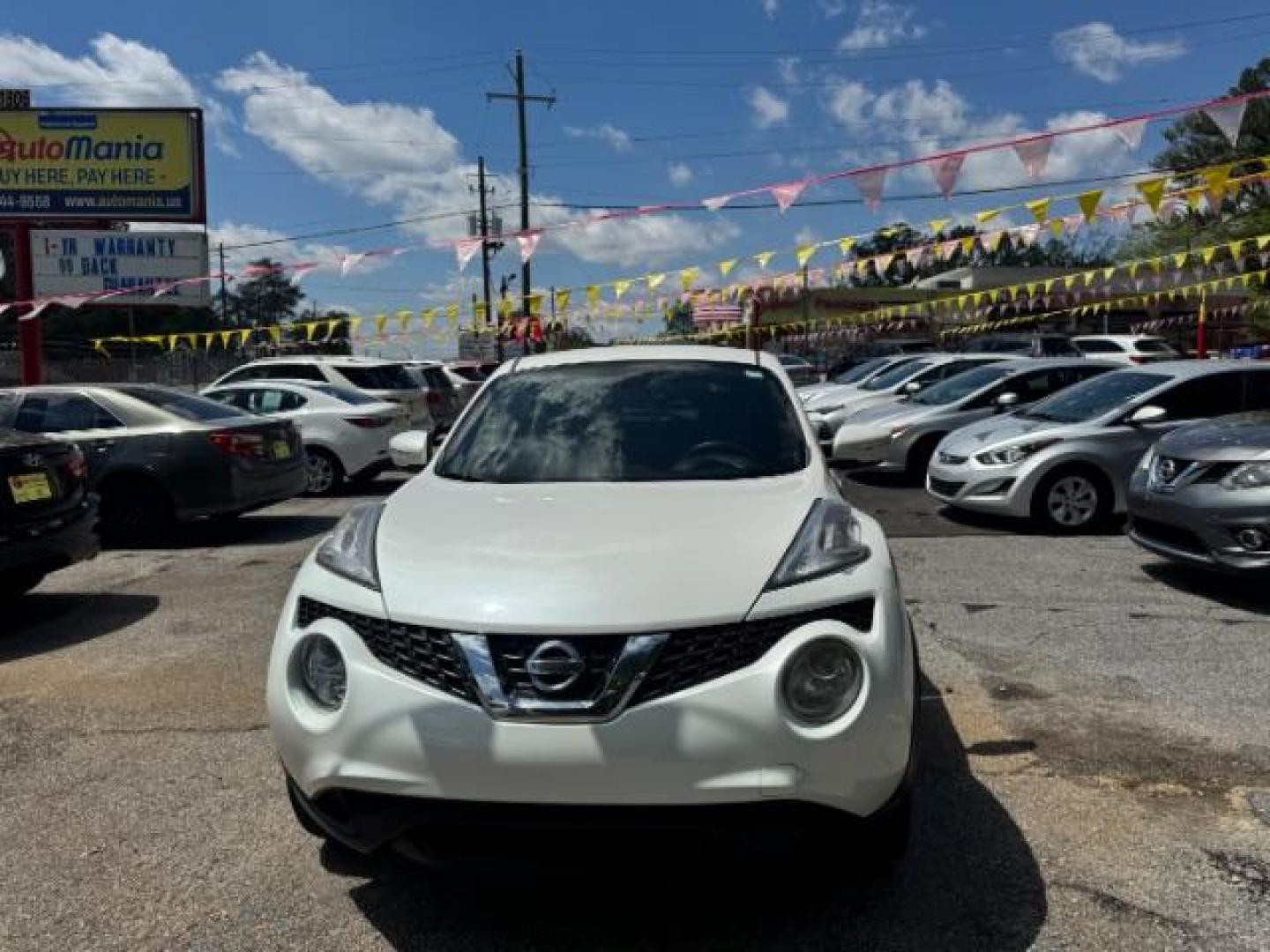 2015 Cream Nissan Juke S (JN8AF5MR2FT) with an 1.6L I-4 gasoline direct injection engine, located at 1806 Veterans Memorial Hwy SW, Austell, GA, 30168, (770) 944-9558, 33.817959, -84.606987 - Photo#1