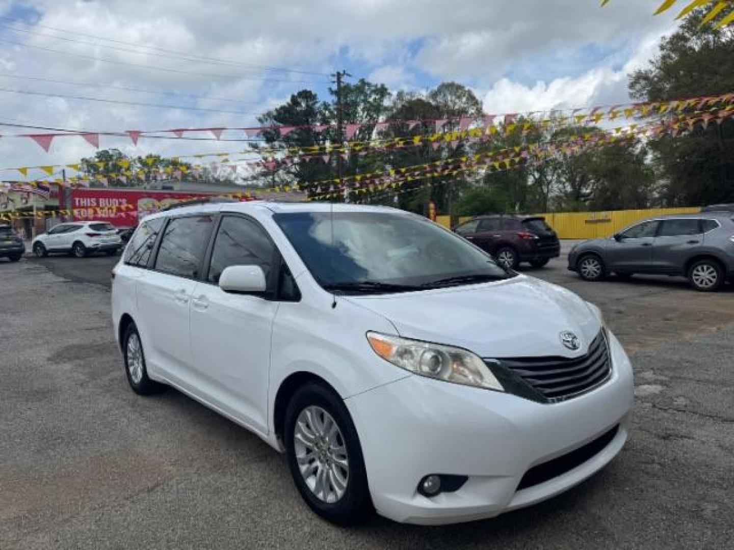 2013 White Toyota Sienna XLE V6 7 Passenger Auto Access Seat (5TDYK3DC4DS) with an 3.5L V-6 DOHC engine, located at 1806 Veterans Memorial Hwy SW, Austell, GA, 30168, (770) 944-9558, 33.817959, -84.606987 - Photo#2