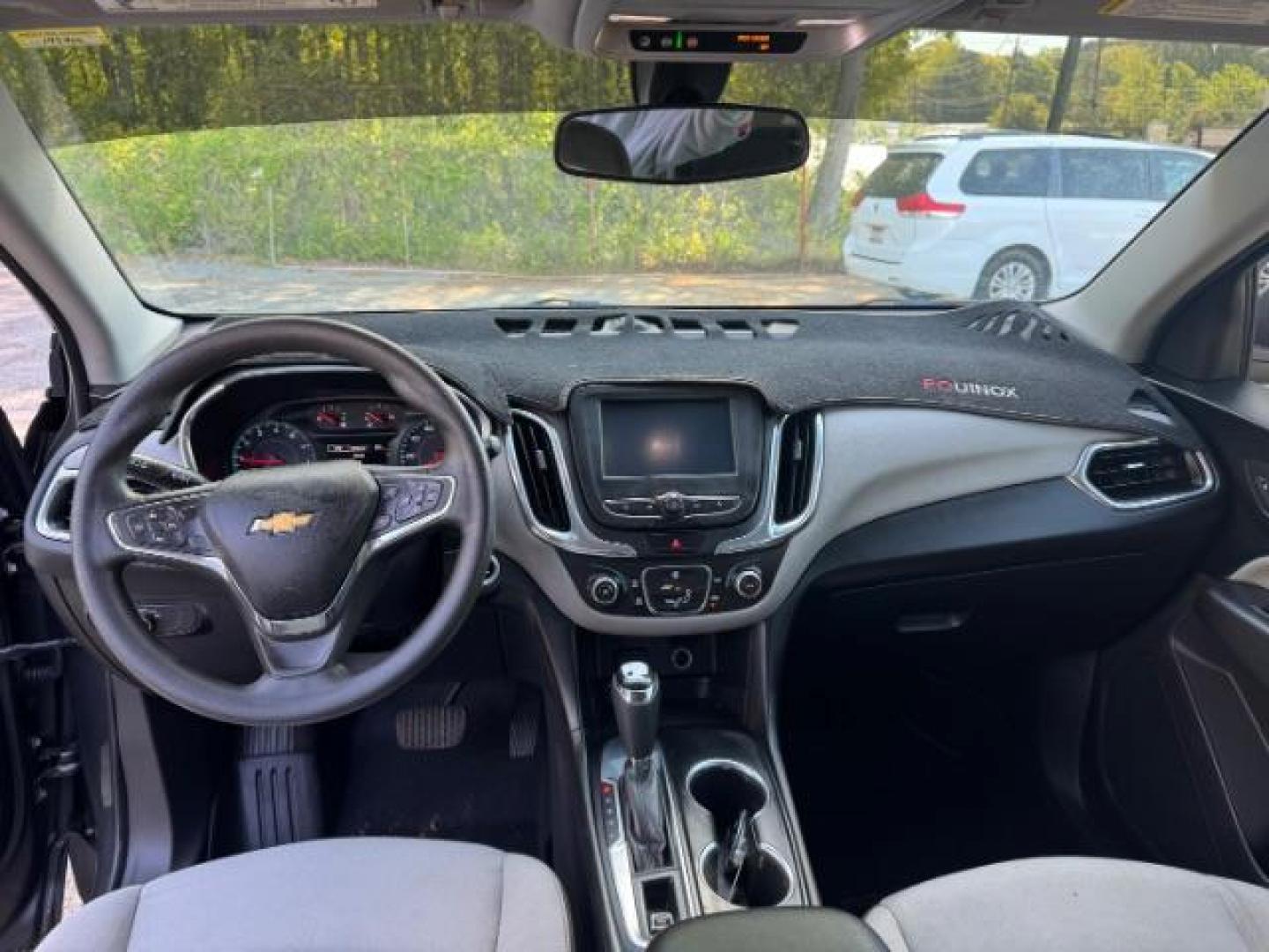 2018 Gray Chevrolet Equinox LS (3GNAXHEV0JS) with an 1.5L I-4 gasoline direct injection engine, located at 1806 Veterans Memorial Hwy SW, Austell, GA, 30168, (770) 944-9558, 33.817959, -84.606987 - Photo#9