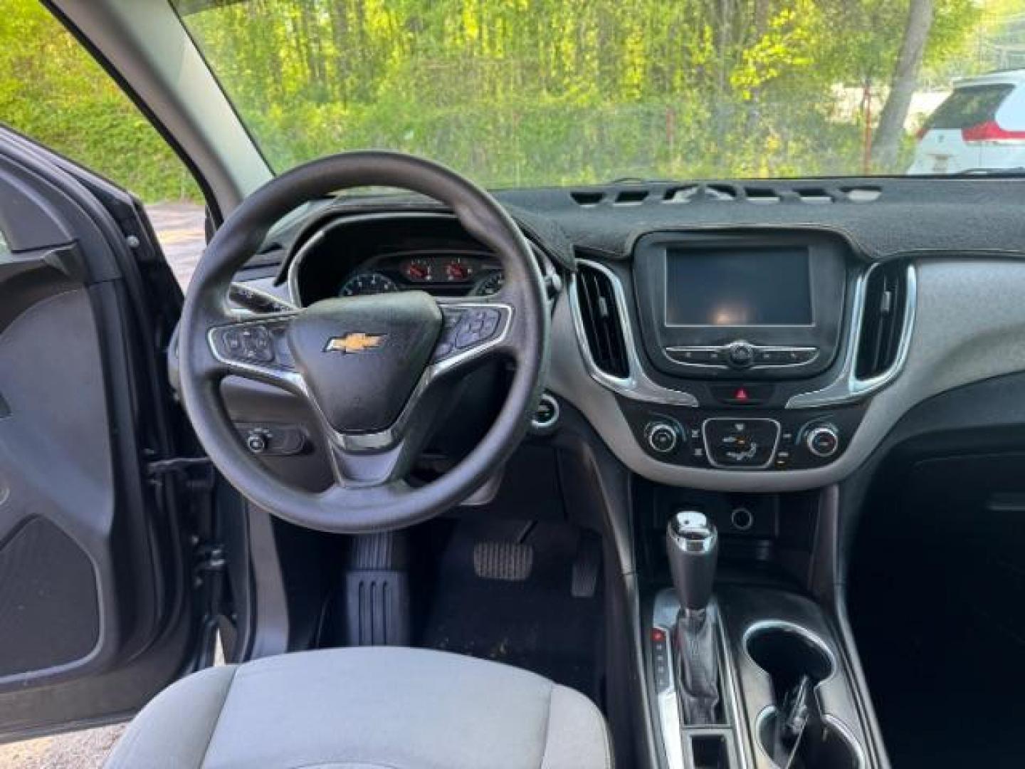 2018 Gray Chevrolet Equinox LS (3GNAXHEV0JS) with an 1.5L I-4 gasoline direct injection engine, located at 1806 Veterans Memorial Hwy SW, Austell, GA, 30168, (770) 944-9558, 33.817959, -84.606987 - Photo#11