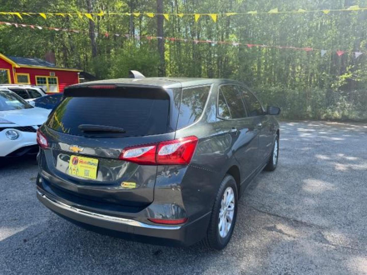 2018 Gray Chevrolet Equinox LS (3GNAXHEV0JS) with an 1.5L I-4 gasoline direct injection engine, located at 1806 Veterans Memorial Hwy SW, Austell, GA, 30168, (770) 944-9558, 33.817959, -84.606987 - Photo#3