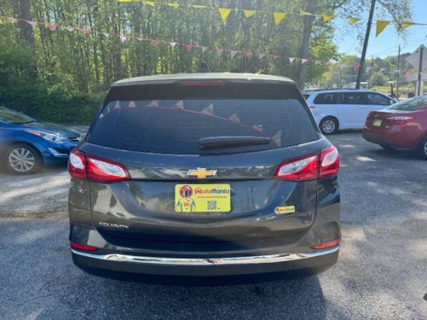 2018 Gray Chevrolet Equinox LS (3GNAXHEV0JS) with an 1.5L I-4 gasoline direct injection engine, located at 1806 Veterans Memorial Hwy SW, Austell, GA, 30168, (770) 944-9558, 33.817959, -84.606987 - Photo#4