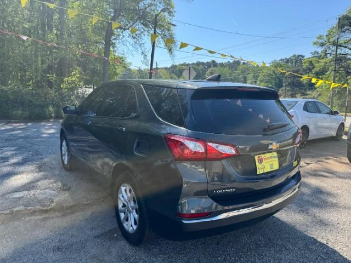 2018 Gray Chevrolet Equinox LS (3GNAXHEV0JS) with an 1.5L I-4 gasoline direct injection engine, located at 1806 Veterans Memorial Hwy SW, Austell, GA, 30168, (770) 944-9558, 33.817959, -84.606987 - Photo#5