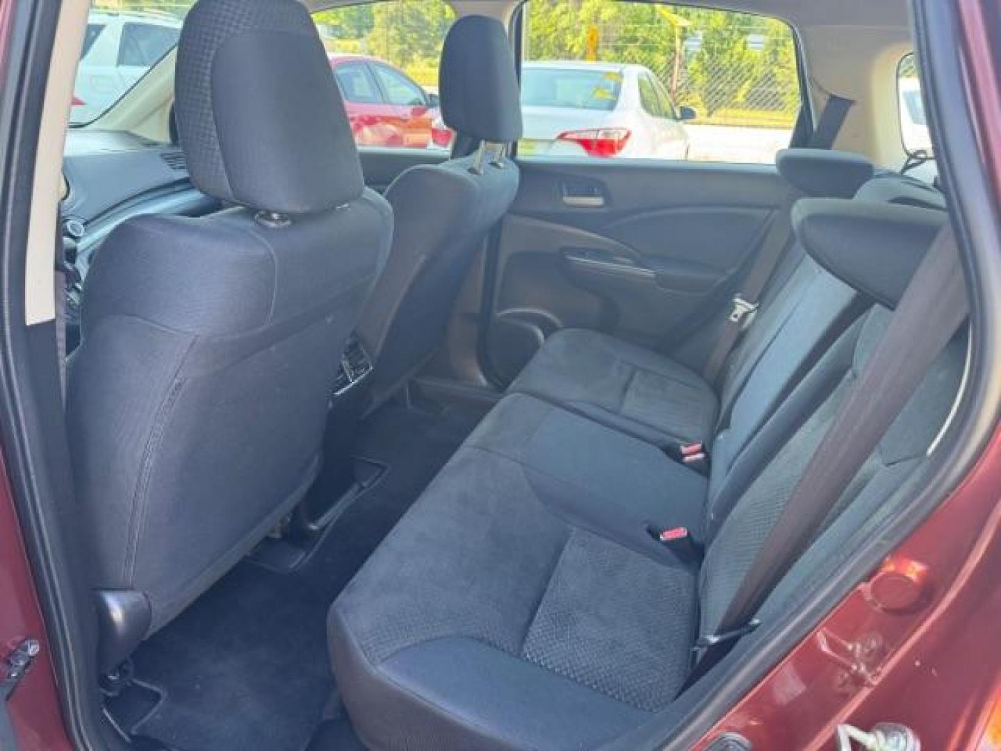 2015 Brown Honda CR-V LX (2HKRM3H39FH) with an 2.4L I-4 gasoline direct injection engine, located at 1806 Veterans Memorial Hwy SW, Austell, GA, 30168, (770) 944-9558, 33.817959, -84.606987 - Photo#9