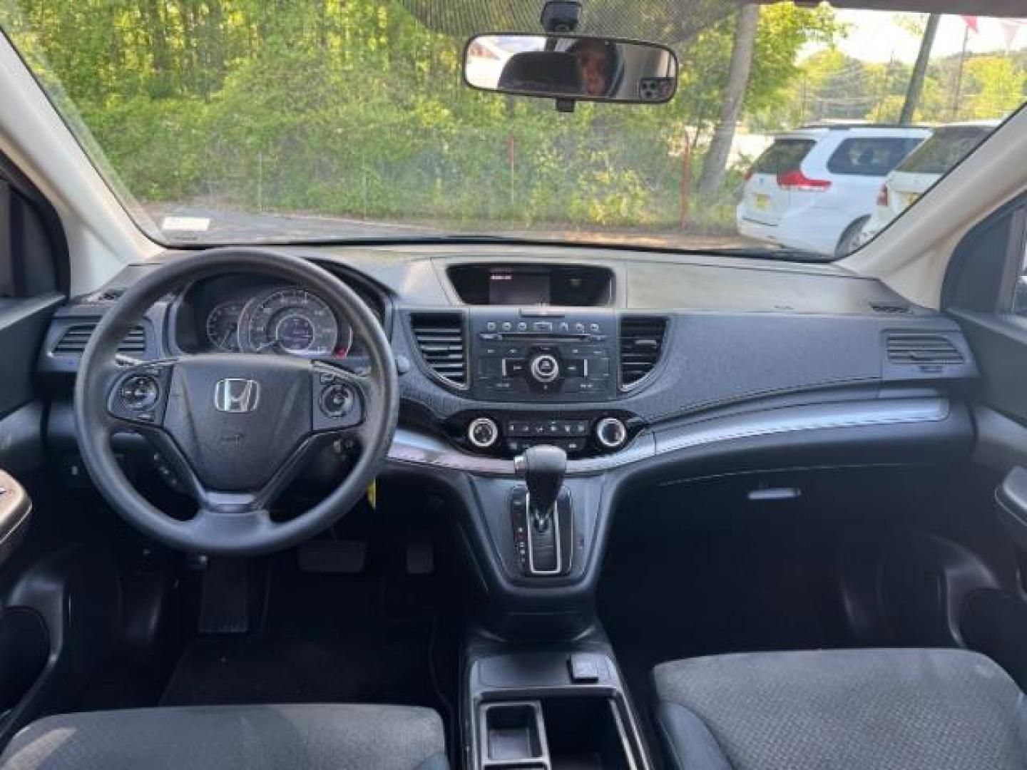 2015 Brown Honda CR-V LX (2HKRM3H39FH) with an 2.4L I-4 gasoline direct injection engine, located at 1806 Veterans Memorial Hwy SW, Austell, GA, 30168, (770) 944-9558, 33.817959, -84.606987 - Photo#10