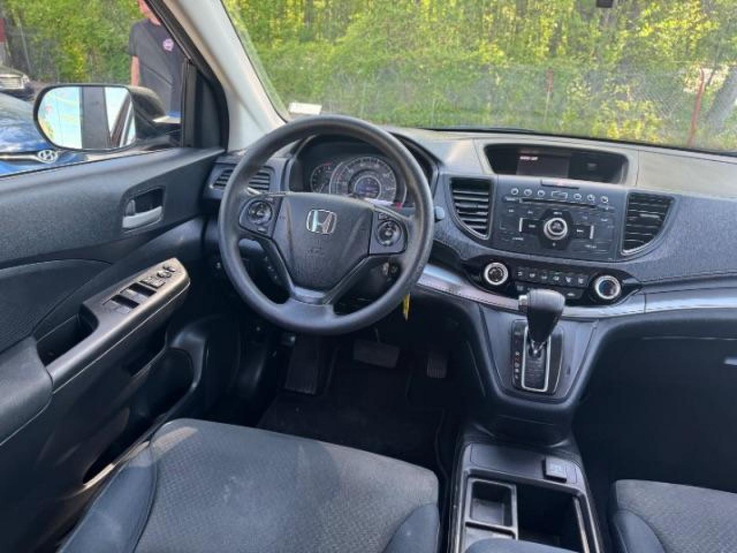2015 Brown Honda CR-V LX (2HKRM3H39FH) with an 2.4L I-4 gasoline direct injection engine, located at 1806 Veterans Memorial Hwy SW, Austell, GA, 30168, (770) 944-9558, 33.817959, -84.606987 - Photo#12