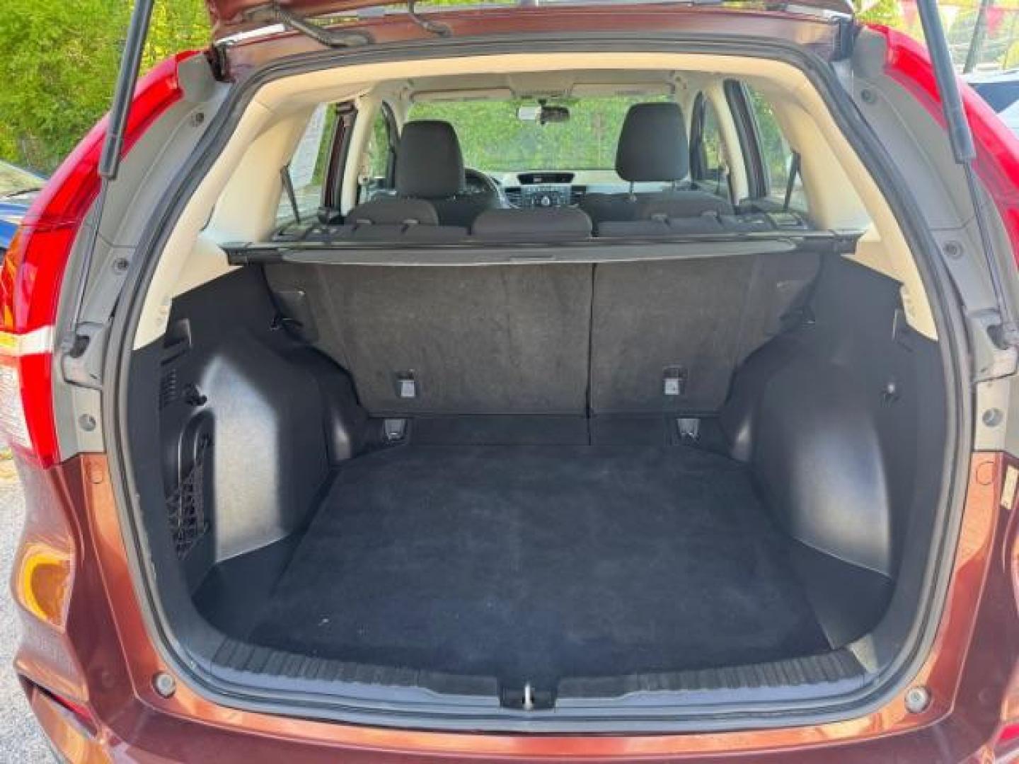 2015 Brown Honda CR-V LX (2HKRM3H39FH) with an 2.4L I-4 gasoline direct injection engine, located at 1806 Veterans Memorial Hwy SW, Austell, GA, 30168, (770) 944-9558, 33.817959, -84.606987 - Photo#13
