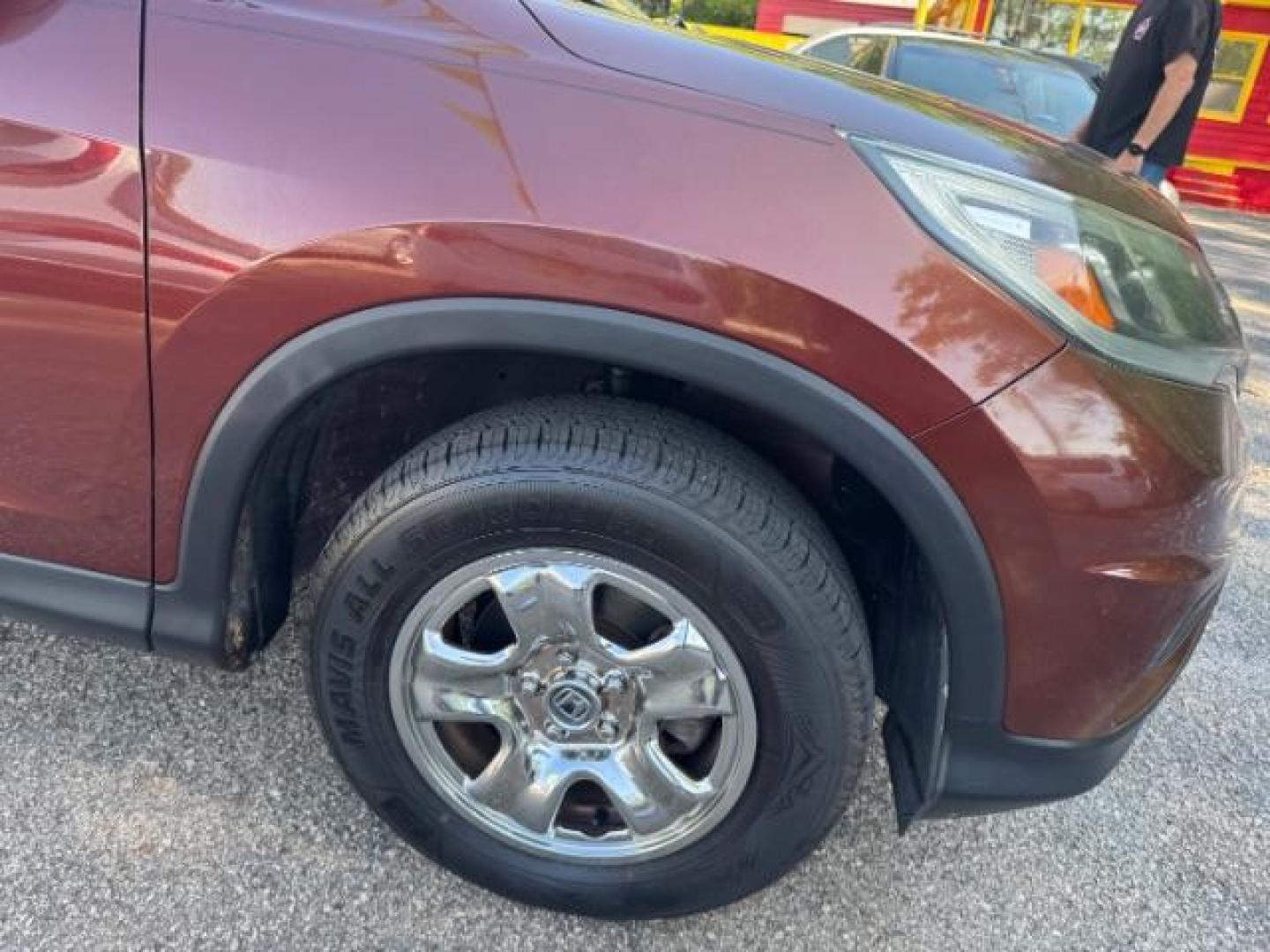 2015 Brown Honda CR-V LX (2HKRM3H39FH) with an 2.4L I-4 gasoline direct injection engine, located at 1806 Veterans Memorial Hwy SW, Austell, GA, 30168, (770) 944-9558, 33.817959, -84.606987 - Photo#18