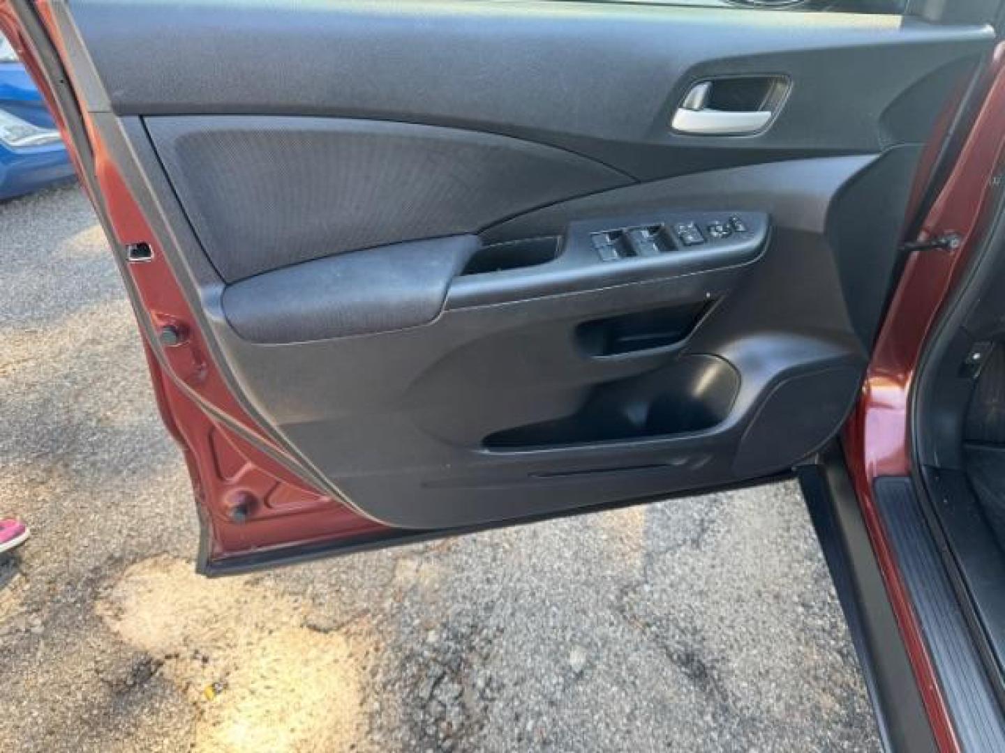 2015 Brown Honda CR-V LX (2HKRM3H39FH) with an 2.4L I-4 gasoline direct injection engine, located at 1806 Veterans Memorial Hwy SW, Austell, GA, 30168, (770) 944-9558, 33.817959, -84.606987 - Photo#7